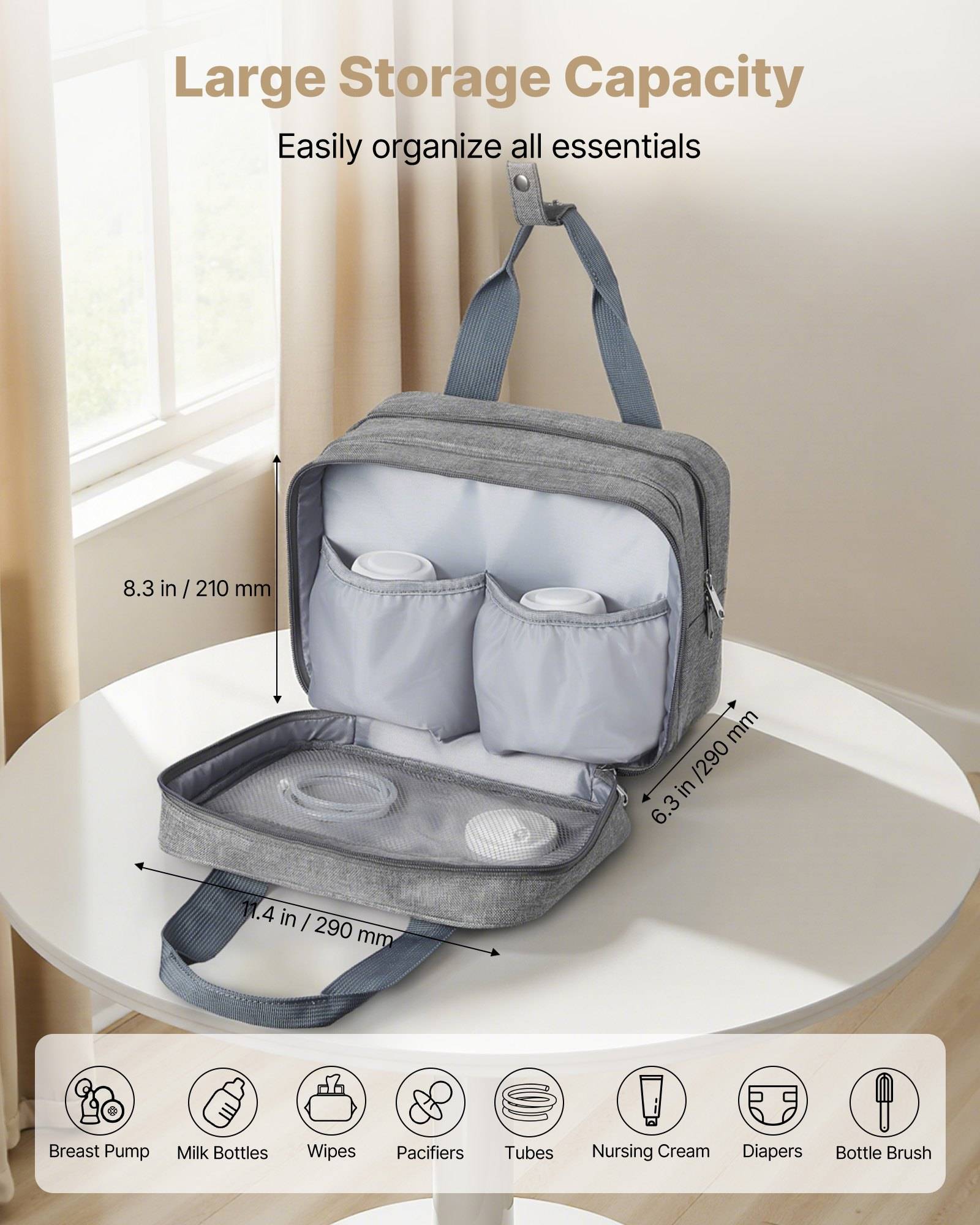Graue isolierte Wickeltasche für Babys mit mehreren Fächern und gekennzeichneten Abmessungen, die große Speicherkapazität für Milchpumpe, Flaschen, Feuchttücher, Schnuller, Tuben, Stillcreme, Windeln und Flaschenreiniger bewirbt.