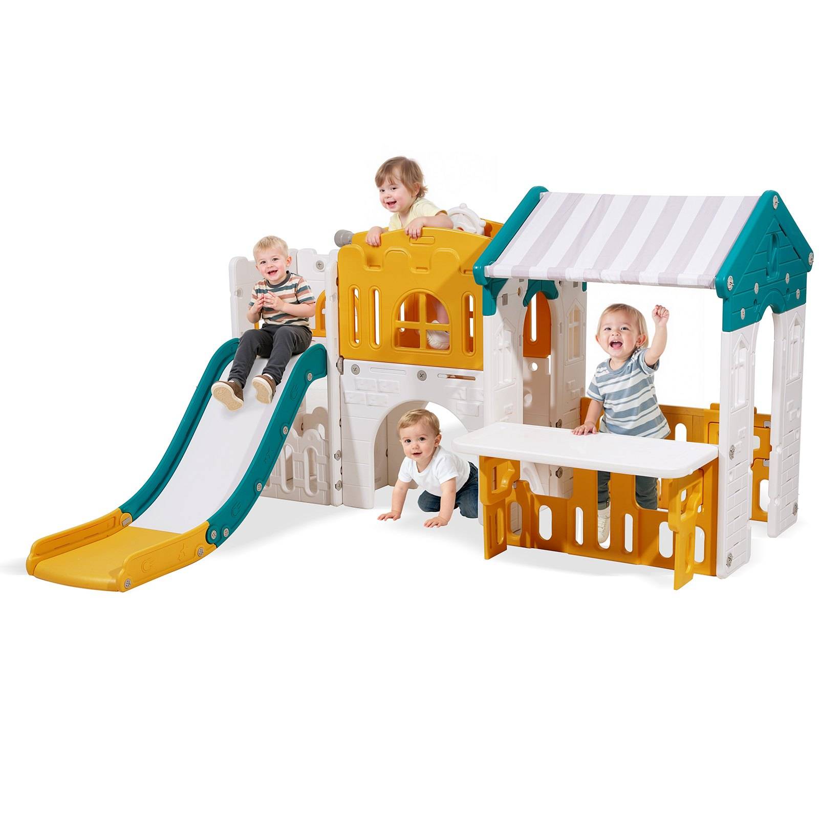 Vier Kleinkinder spielen auf einem bunten Innenspielplatz mit einer Rutsche, einer Kletterwand und einer kleinen überdachten Hausstruktur.