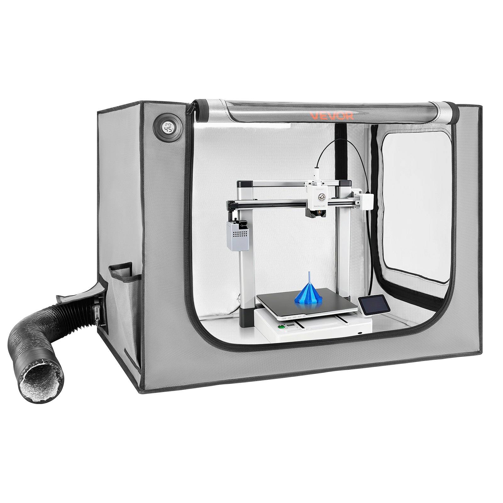 Ein eingeschlossener 3D-Drucker in einer grauen beheizten Kammer mit Frontfenster und seitlichem Abgasschlauch druckt ein kleines blaues Objekt.