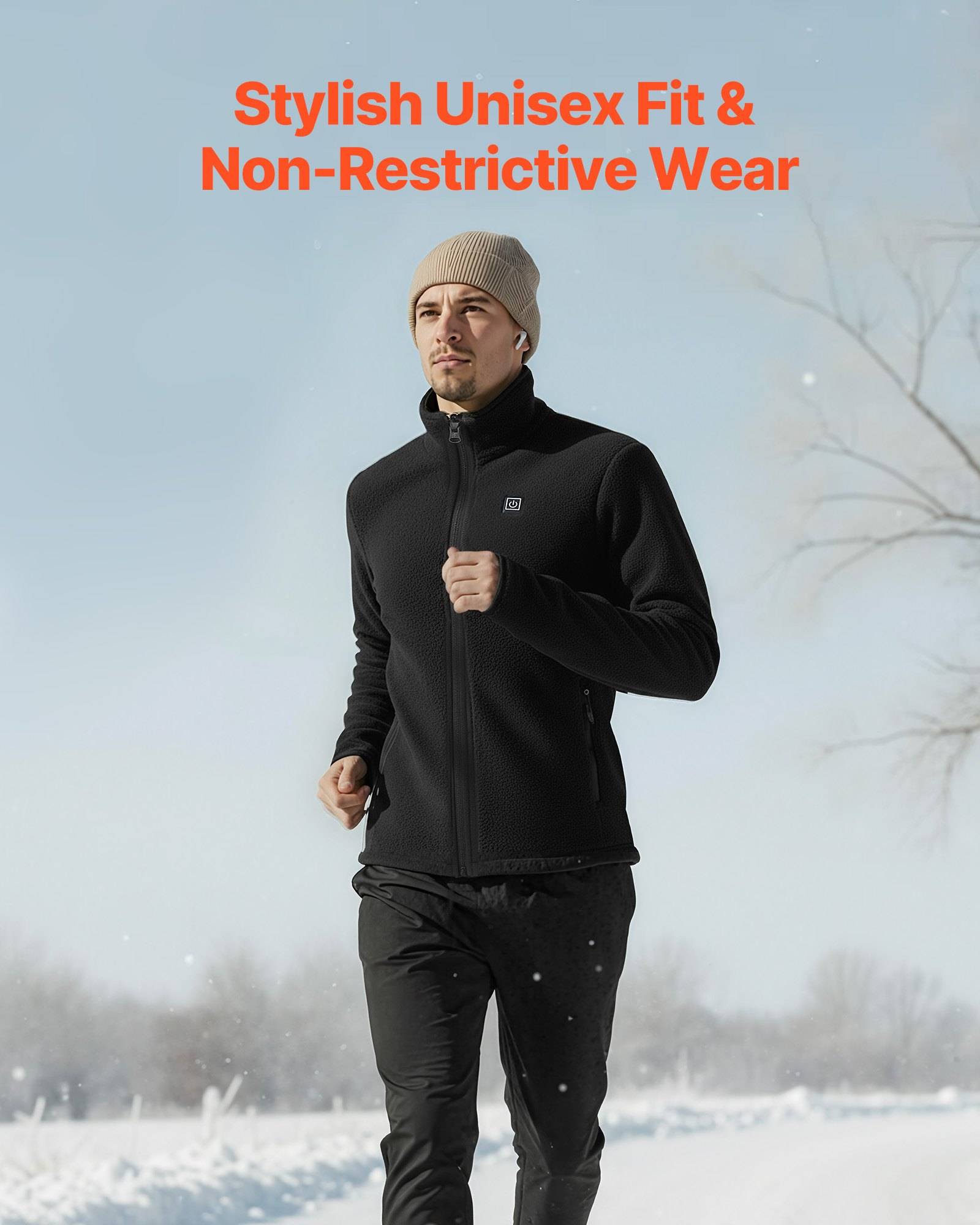 Mann in schwarzer Reißverschluss-Jacke und Hose, der draußen im Schnee läuft, mit dem Text „Stilvolle unisex Passform & nicht einengende Kleidung