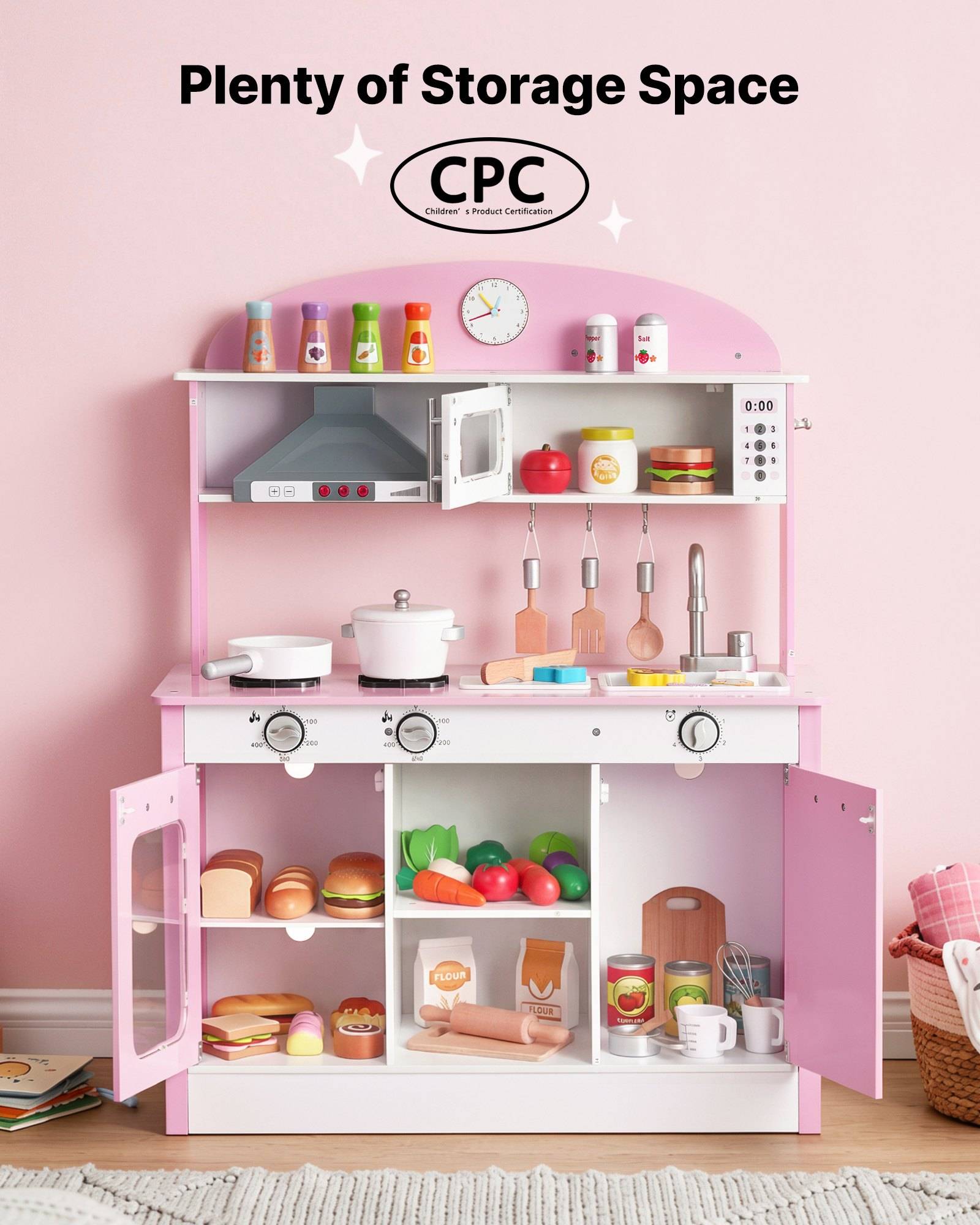 Rosa Spielküche mit offenen Regalen, Herd, Spüle, Backofen und Zubehör, mit der Aufschrift „Viel Stauraum" und CPC.
