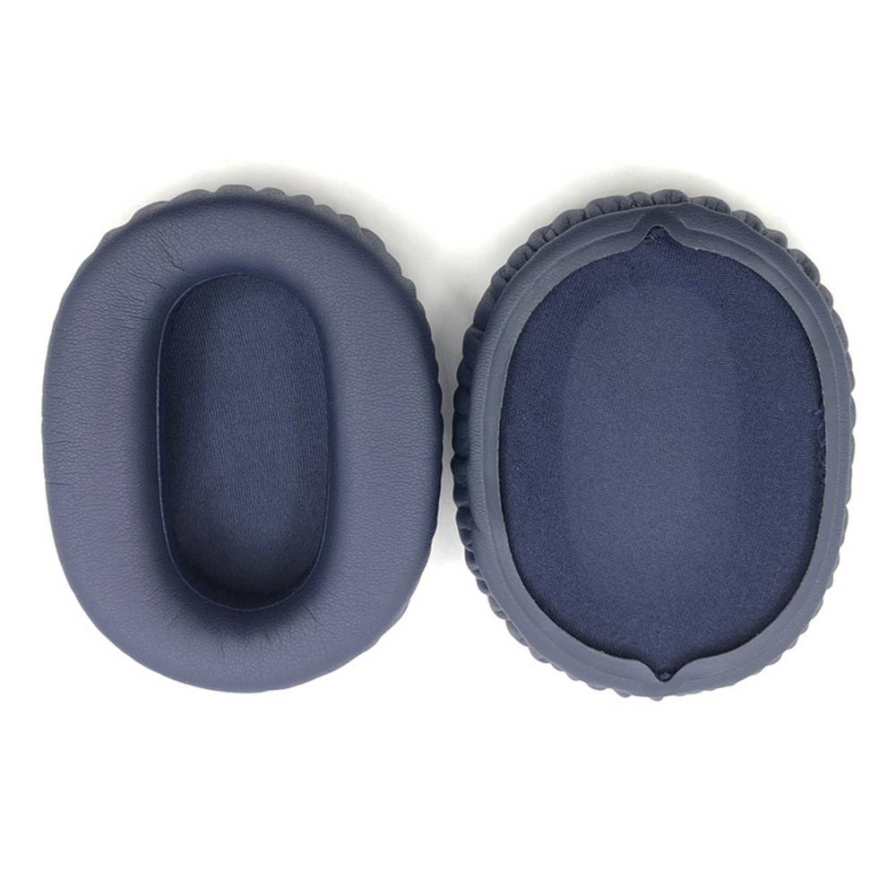 Zwei marineblaue Ersatz-Ohrkissen nebeneinander gezeigt, oval mit weich gepolsterten Innenseiten auf weißem Hintergrund.