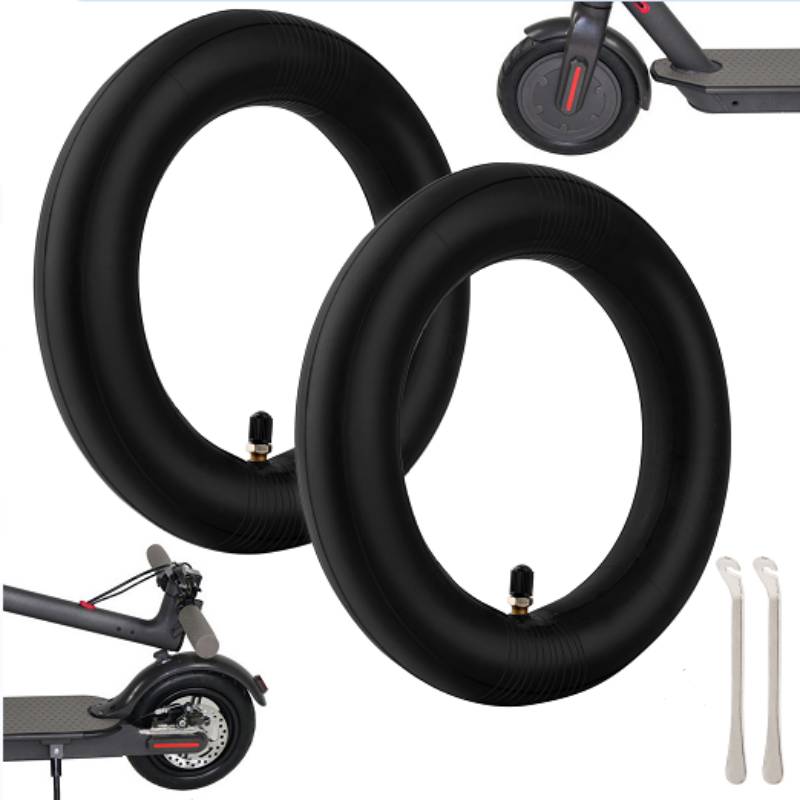 Zwei schwarze, massive Ersatz-Roller-Schläuche mit Ventilen, dargestellt mit einem Roller-Rad und Reifenhebeln.