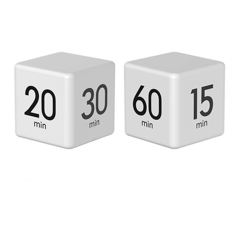 Zwei weiße Timer-Würfel zeigen Minutenwerte 20 und 30 auf dem einen, 60 und 15 auf dem anderen, was auf einstellbare Zeiteinstellungen hindeutet.