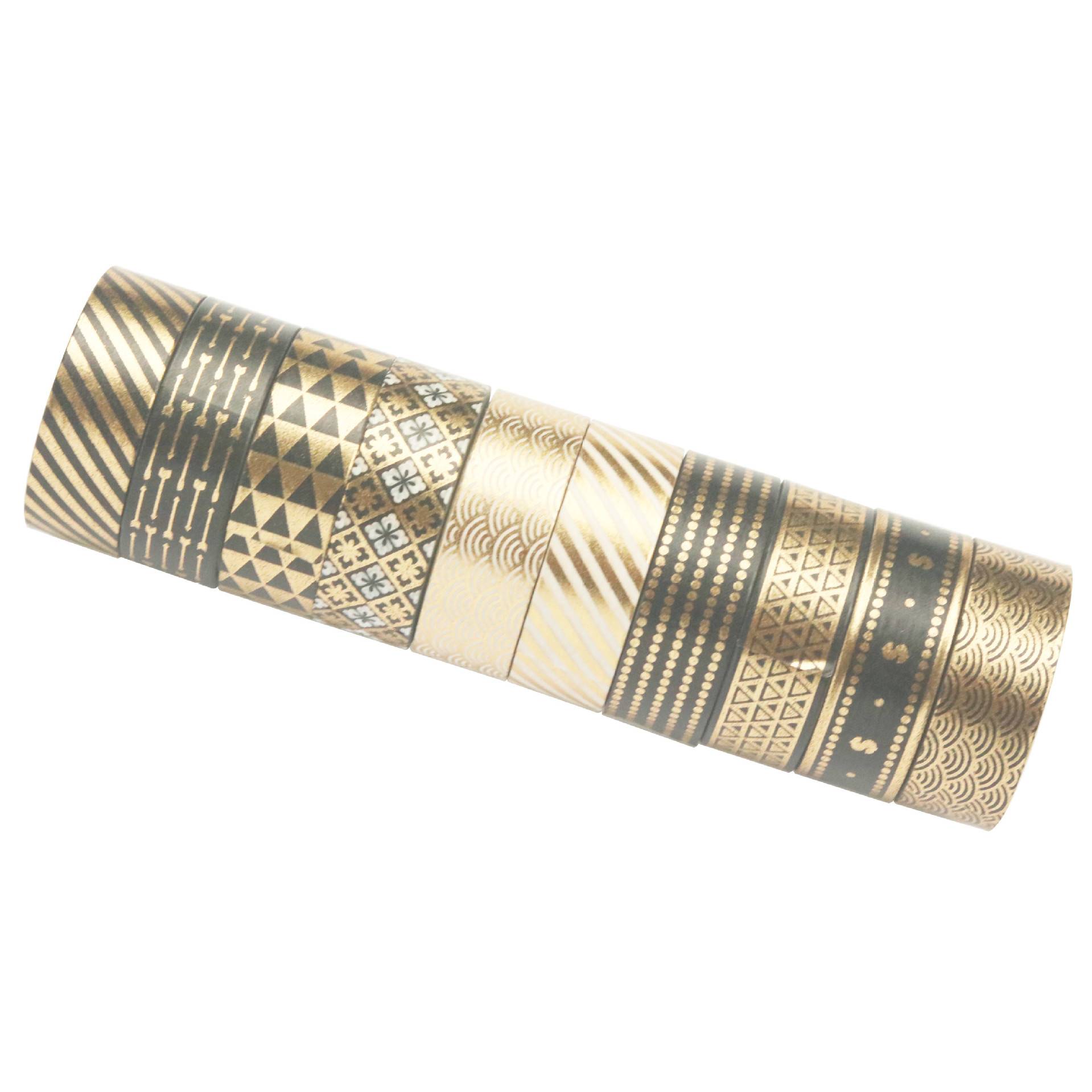 Rolle dekorativen Washi-Tape mit Gold- und schwarzen geometrischen Mustern auf weißem Hintergrund.