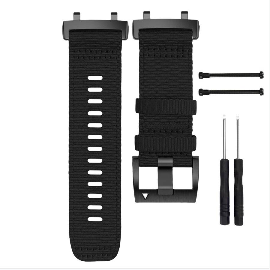 Schwarzes Austausch-Uhrenarmband mit Schließe, zwei Federstegen und zwei kleinen Schraubenziehern auf weißem Hintergrund gezeigt.