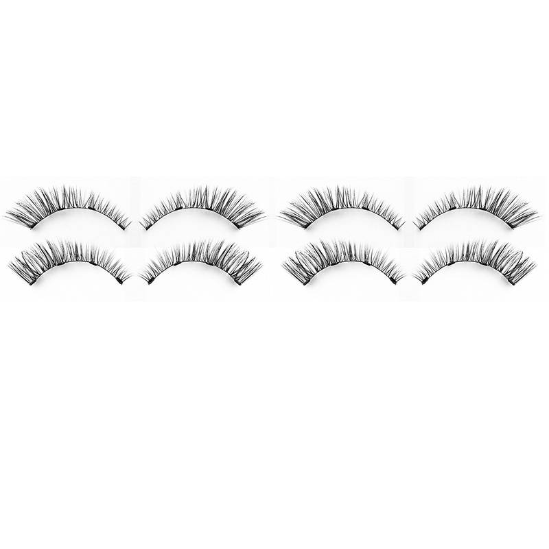Vier Paar falsche Wimpern auf weißem Hintergrund angeordnet.