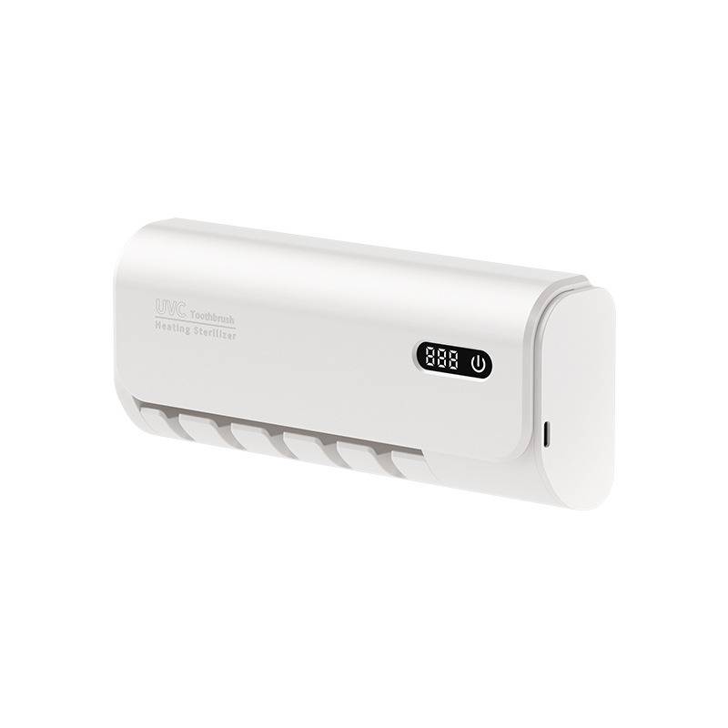 Weiße wandmontierte UV-Zahnbürsten-Sterilisiereinheit mit digitaler Anzeige und Netzschalter auf neutralem Hintergrund.