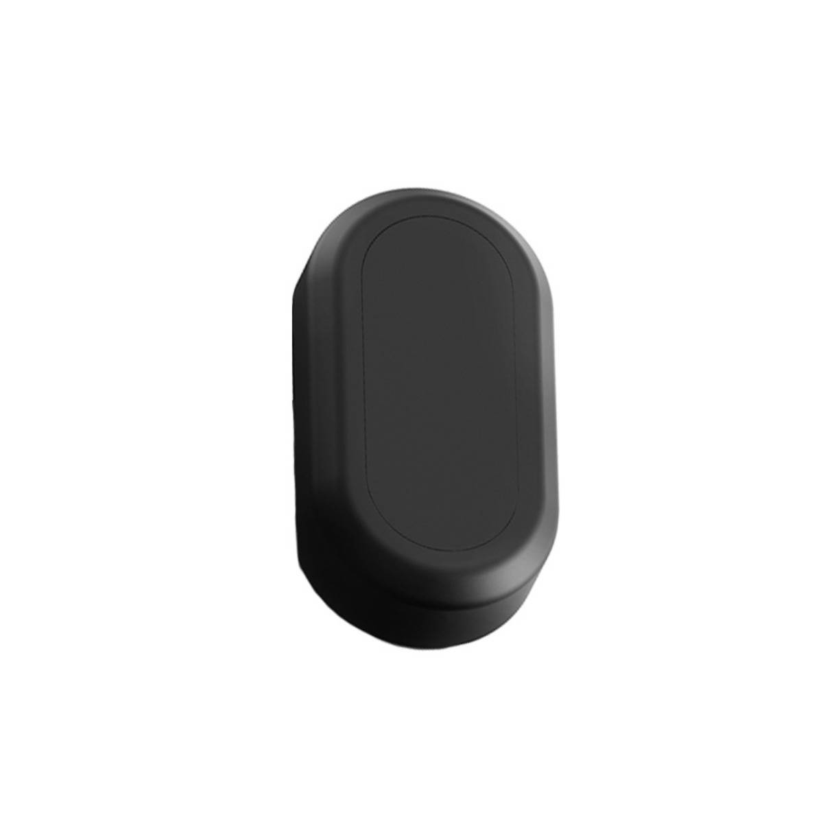 Ein kleines schwarzes ovales elektronisches Gerät oder ein Sensor mit glatter matter Oberfläche auf weißem Hintergrund.