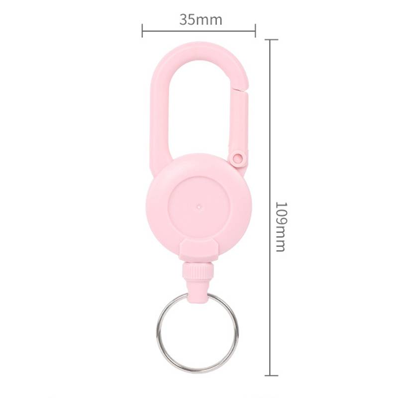 Rosa Karabiner-Schlüsselanhänger mit kreisförmiger Spule und geteiltem Schlüsselring, gezeigt mit Abmessungen von 35 mm Breite und 109 mm Höhe.