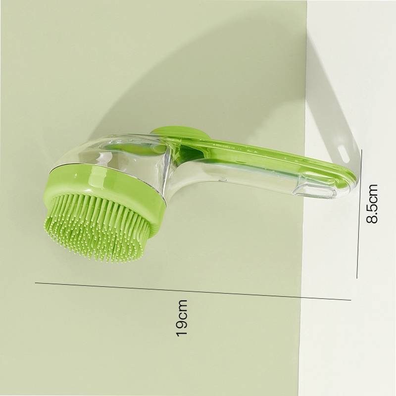 Grüne tragbare Silikon-Schrubberbürste mit Griff, gezeigt mit Größenetikett 19 cm lang und 8,5 cm breit.