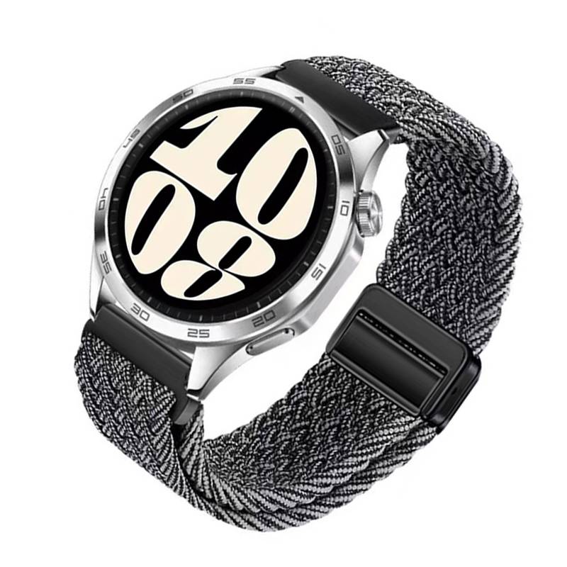 Silberne Smartwatch mit geflochtenem grauem Armband, zeigt große digitale „10:06" auf dem runden Display.