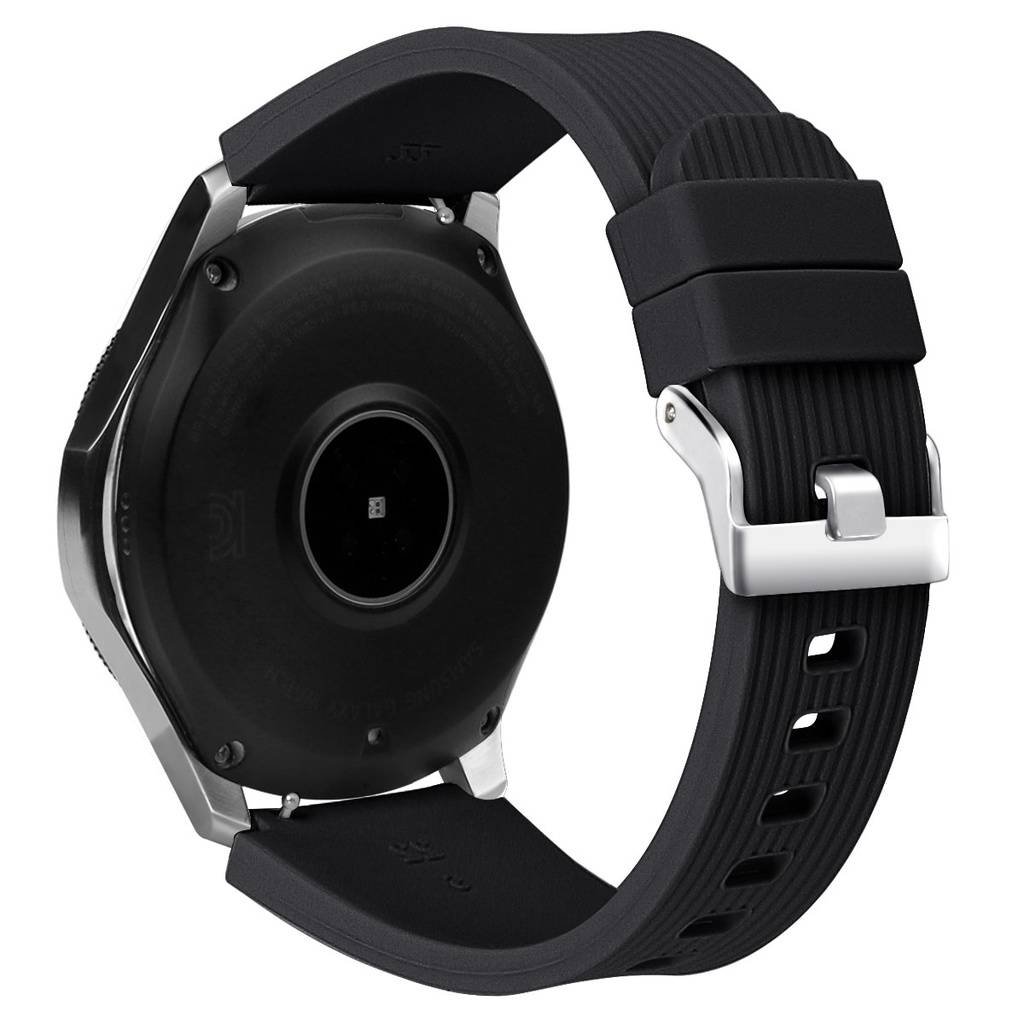 Rückansicht einer schwarzen runden Smartwatch mit schwarzem geripptem Silikonarmband und silbernem Verschluss auf weißem Hintergrund.