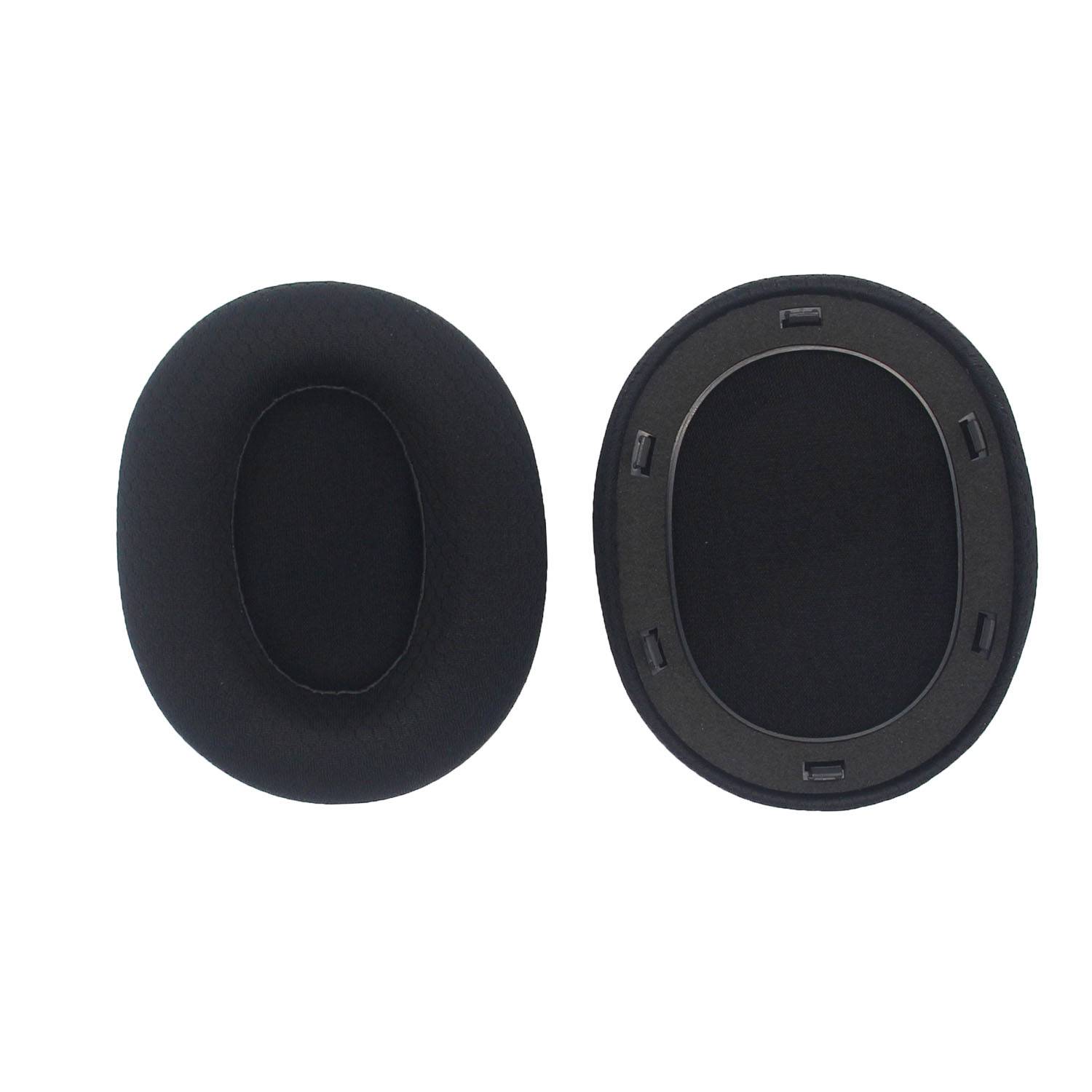 Schwarze ovale Schaumstoff-Ohrmuscheln, von vorne und von hinten gezeigt, wahrscheinlich Ersatzpolster für Kopfhörer oder ein Headset.