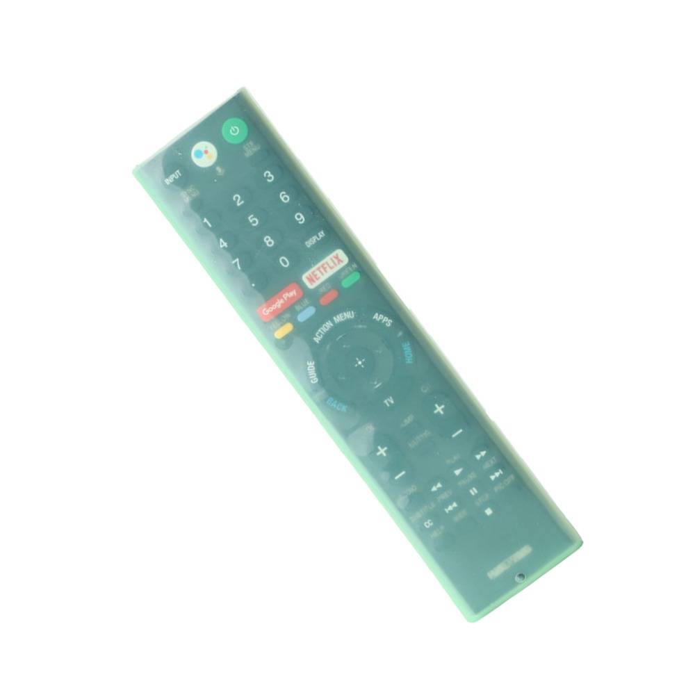 Eine grüne Fernbedienung für den Fernseher mit Nummernschaltflächen, App-Verknüpfungen und einem zentralen Navigationsfeld auf weißem Hintergrund.