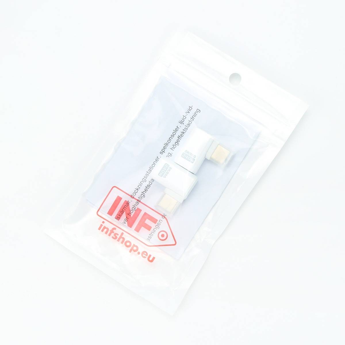 Transparente Blisterpackung mit drei kleinen weißen USB-Adapter/Dongles, beschriftet mit „infshop.eu", auf weißem Hintergrund.