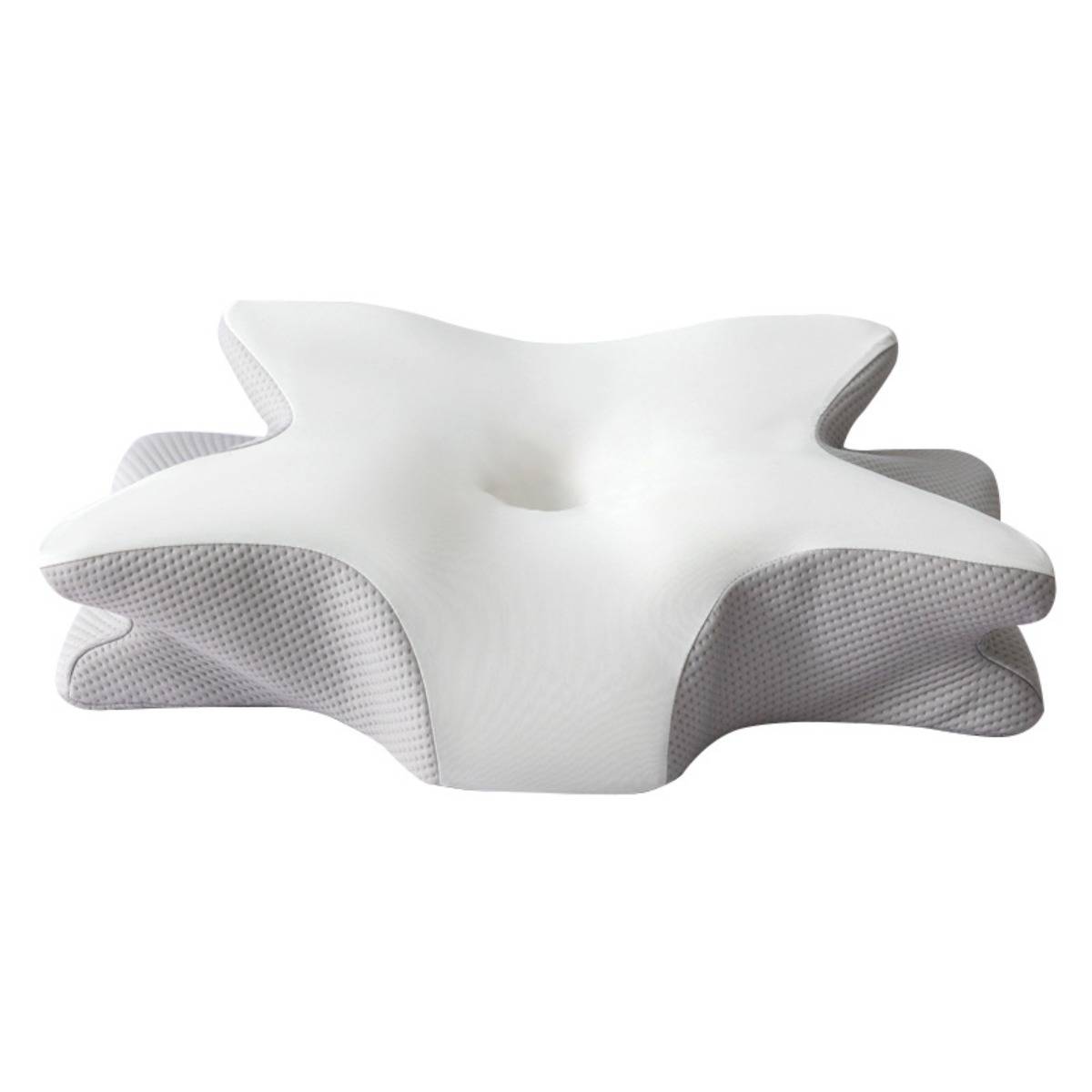 Weißes ergonomisches Memory-Foam-Kissen mit konturierter sternförmiger Form und zentraler Vertiefung auf einfachem Hintergrund.