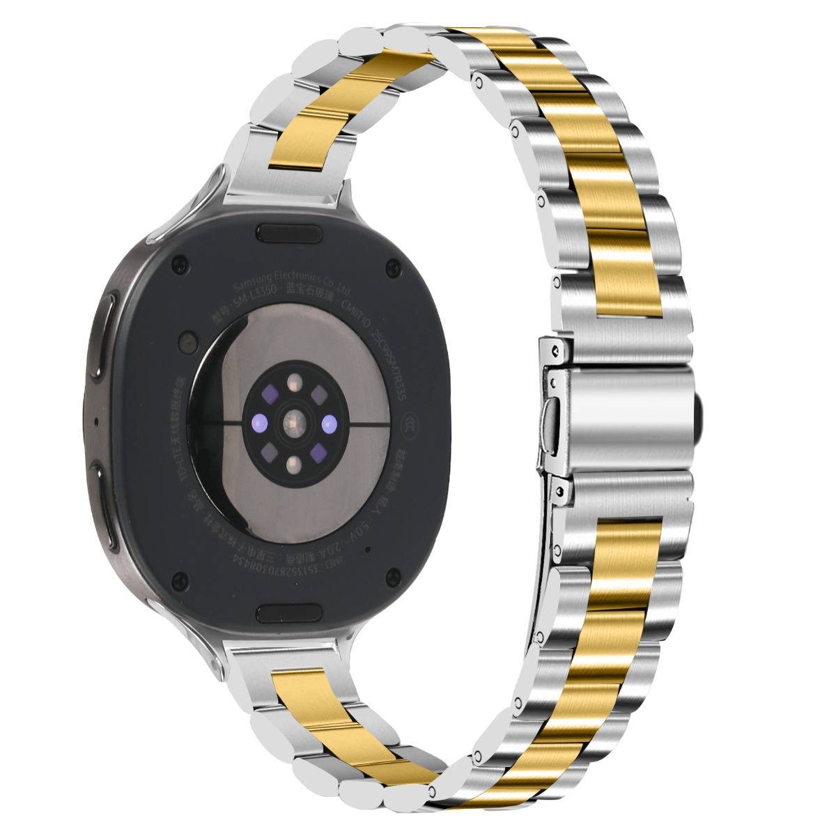 Rückansicht einer Edelstahl-Smartwatch mit goldenen mittleren Gliedern auf dem Armband, zeigt das kreisförmige Sensorarray und die Schließe.