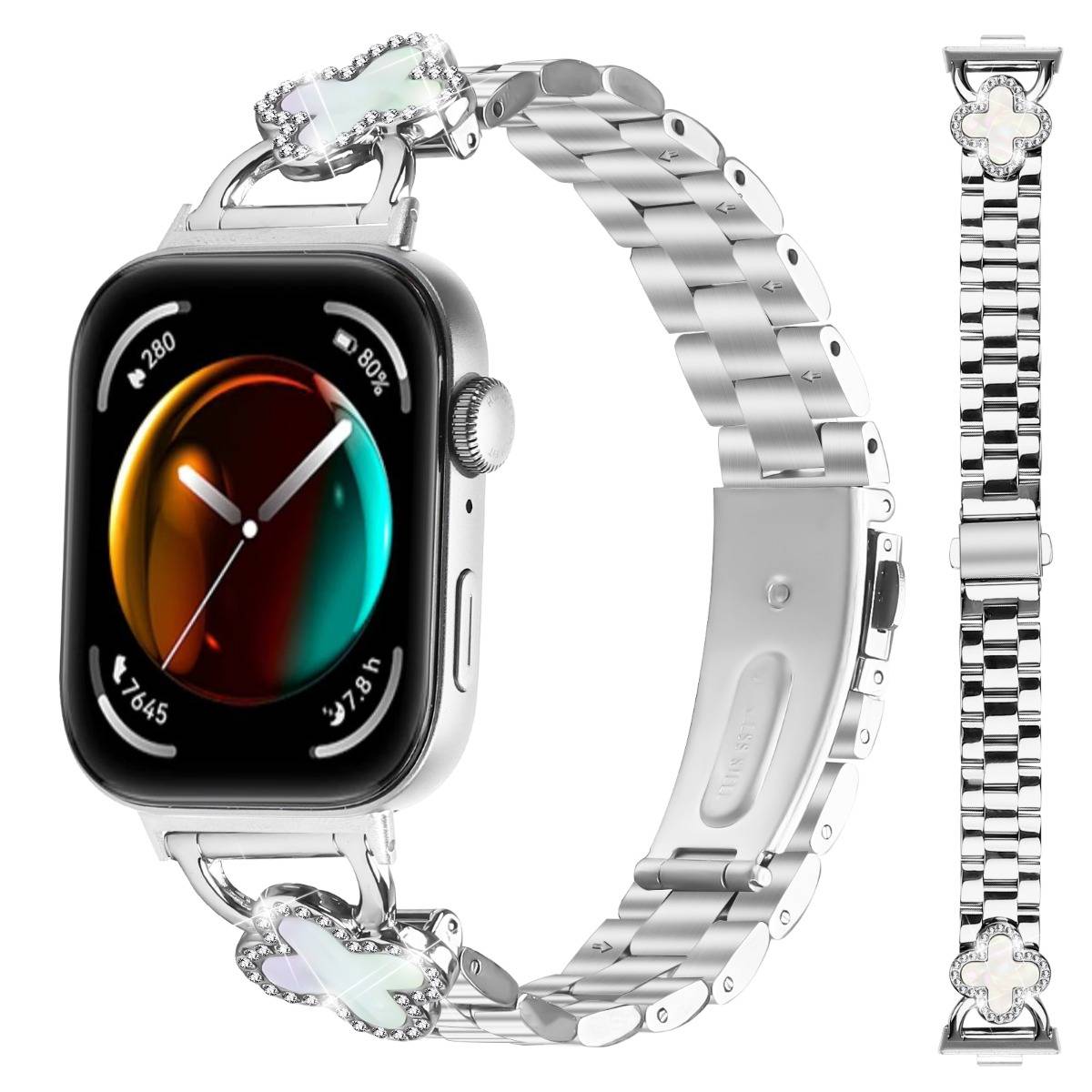 Silbernes Metallarmband für Apple Watch mit Schmetterlings-Link-Design und Kristall-Akzenten, gezeigt auf einer Uhr und als Nahaufnahme des Armbands.