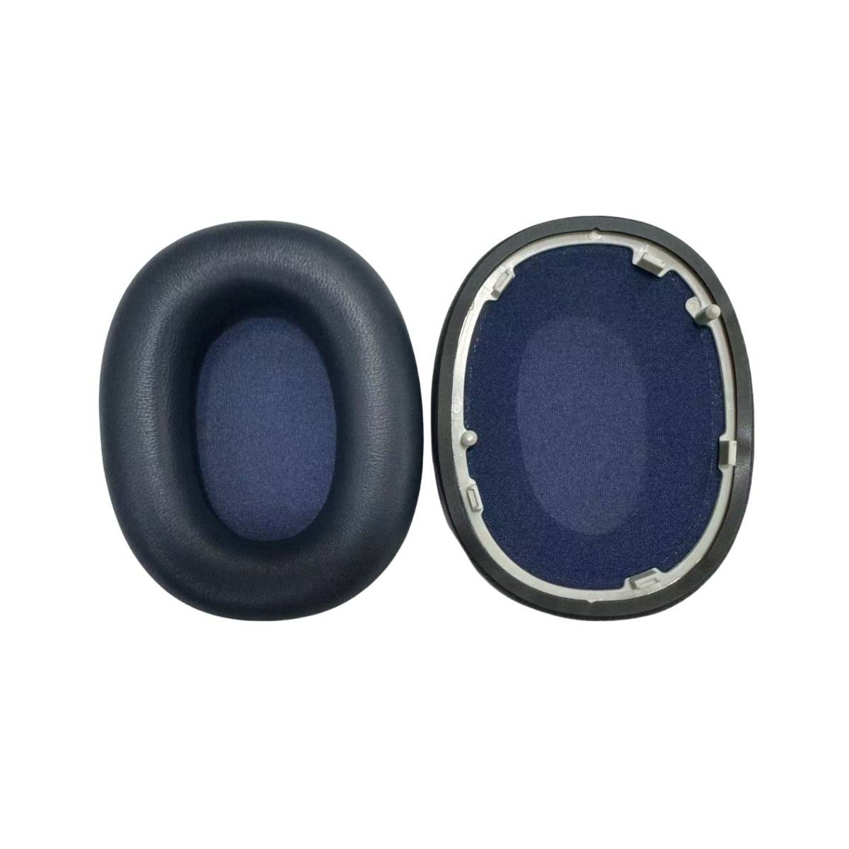 Zwei ovale schwarze Schaumstoff-Ohrpolster, von vorne und hinten gezeigt, mit dem sichtbaren Befestigungsring auf der Rückseite.