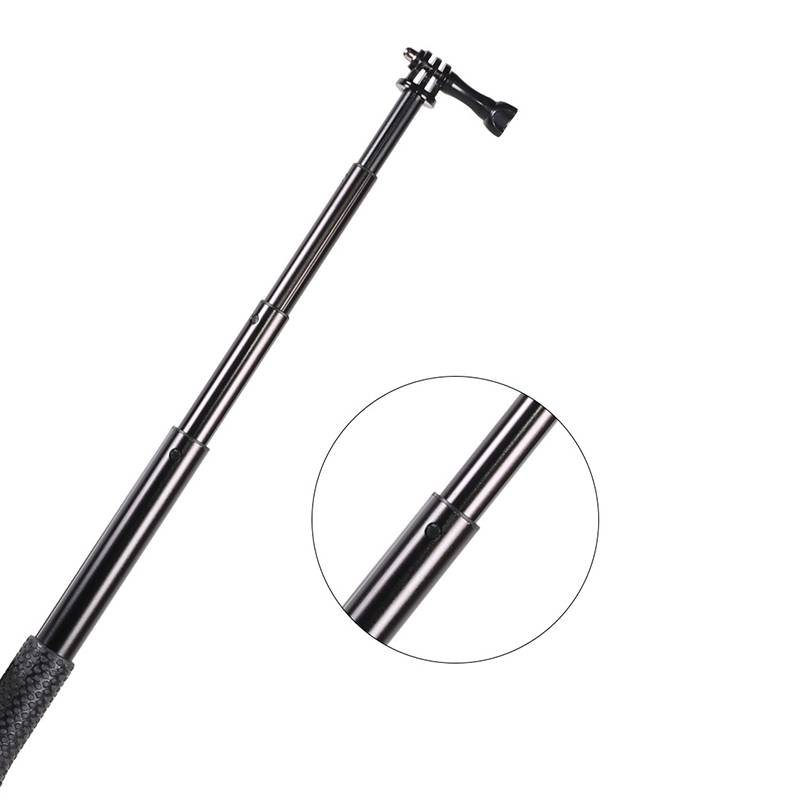 Schwarzer ausziehbarer Monopod-Stab mit Handgelenkschlaufe, diagonal ausgestreckt auf weißem Hintergrund gezeigt, mit einer kreisförmigen Einfassung, die die Verriegelungsknopfverbindung hervorhebt.