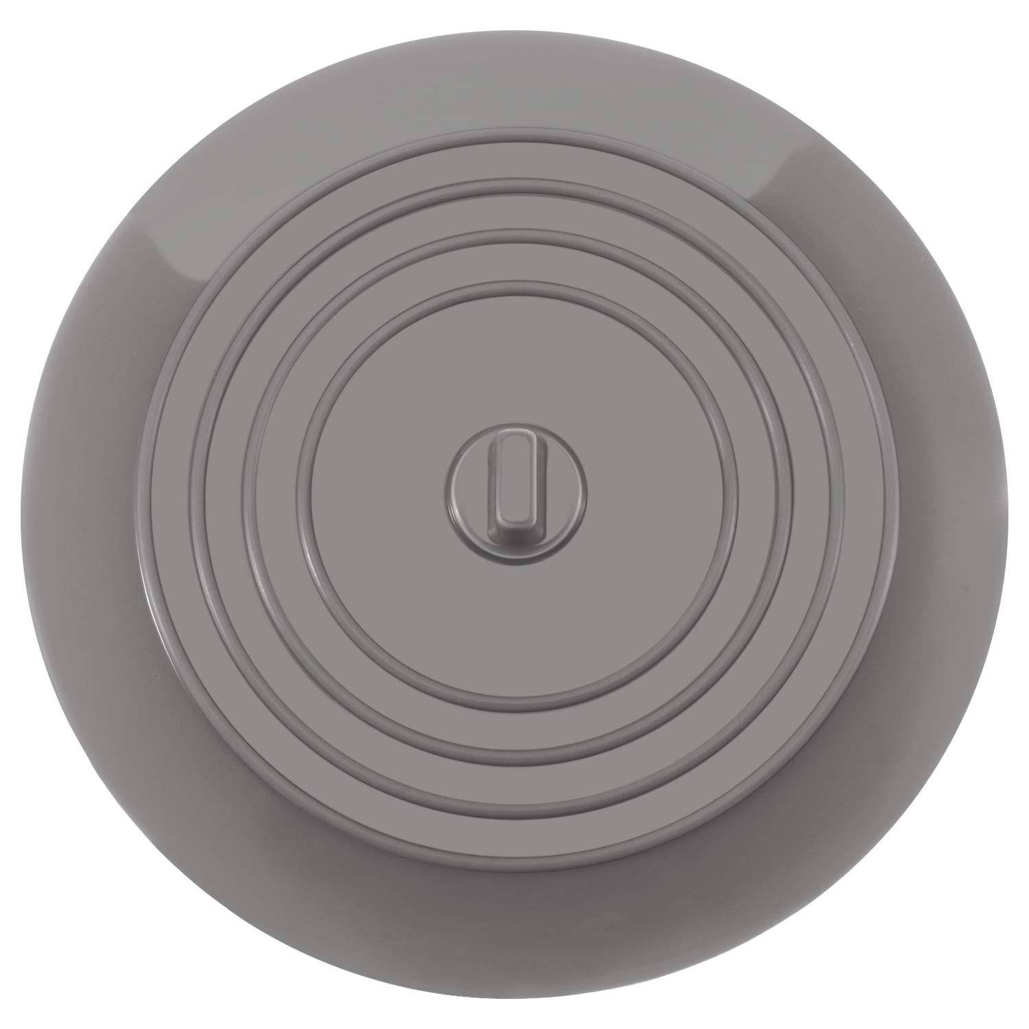 Grauer, runder, versenkt eingebauter Lichtschalter oder Dimmer-Regler mit konzentrischen Ringen und kleinem zentralem Schalter.