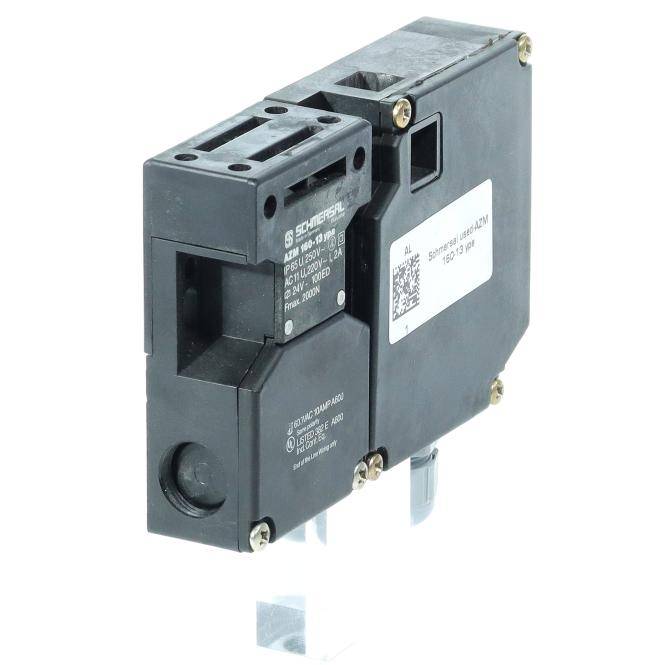 Schwarzes Elektroschutzschalter- oder Relaismodul mit Etikett und Befestigungsmaterial, shown on white background.