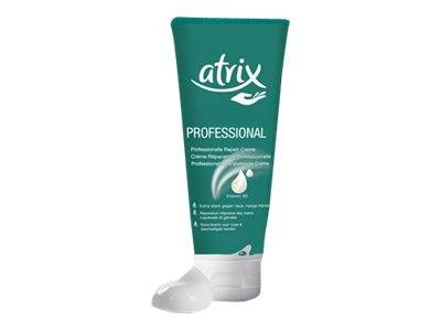 Eine grüne Atrix Professional Handcreme-Tube mit weißem Deckel und einem Klecks Creme daneben auf weißem Hintergrund.