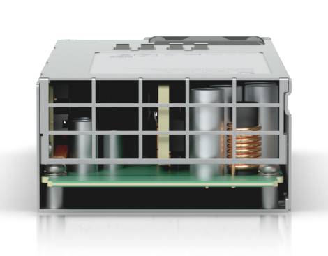 Schnittansicht eines elektronischen Moduls in einem Metallgehäuse mit internen Komponenten wie Zylindern, Schaltkreisen und einer Kupferspule.