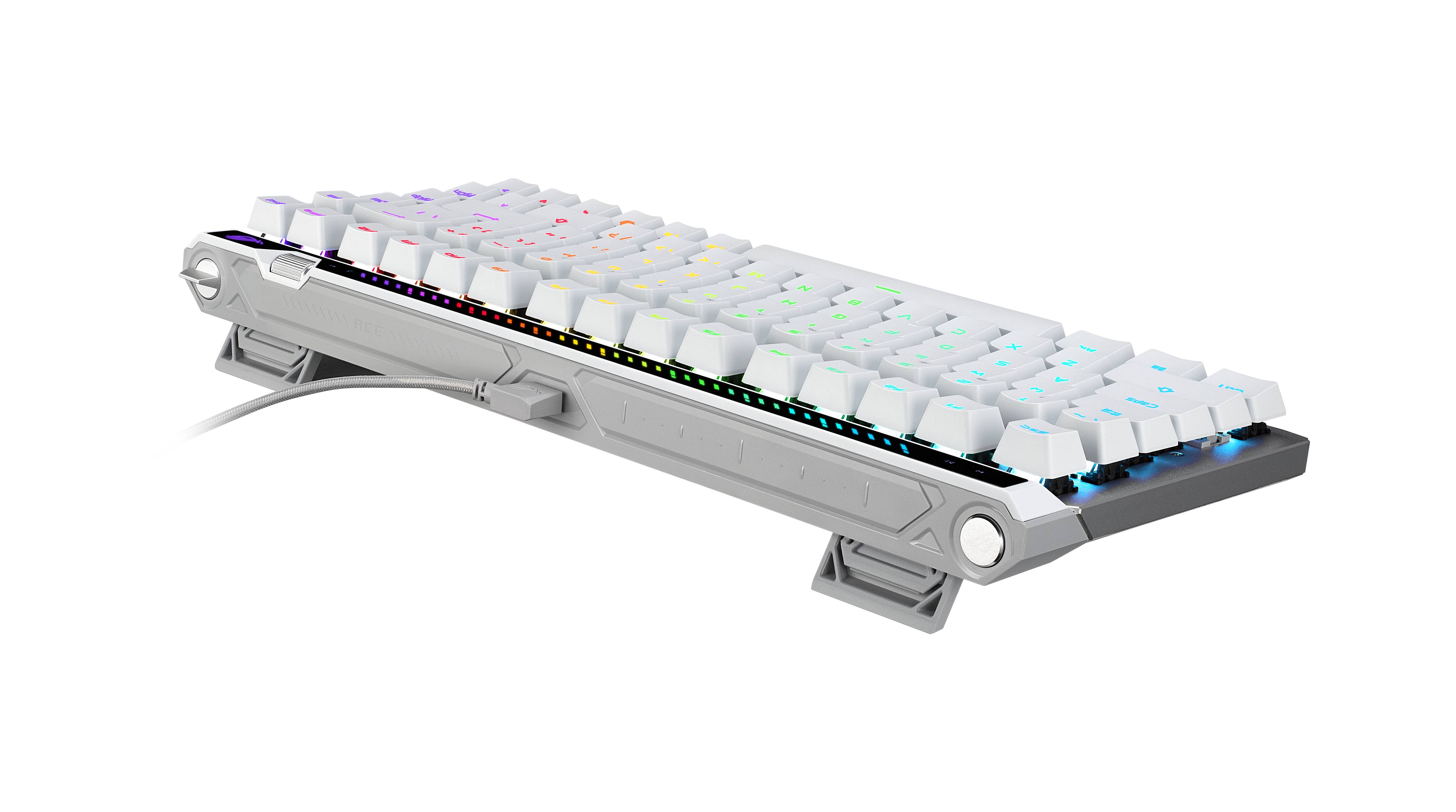 Weiße kompakte mechanische Tastatur in schrägem Winkel gezeigt, mit RGB-beleuchteten Tasten und abnehmbarem Kabel.