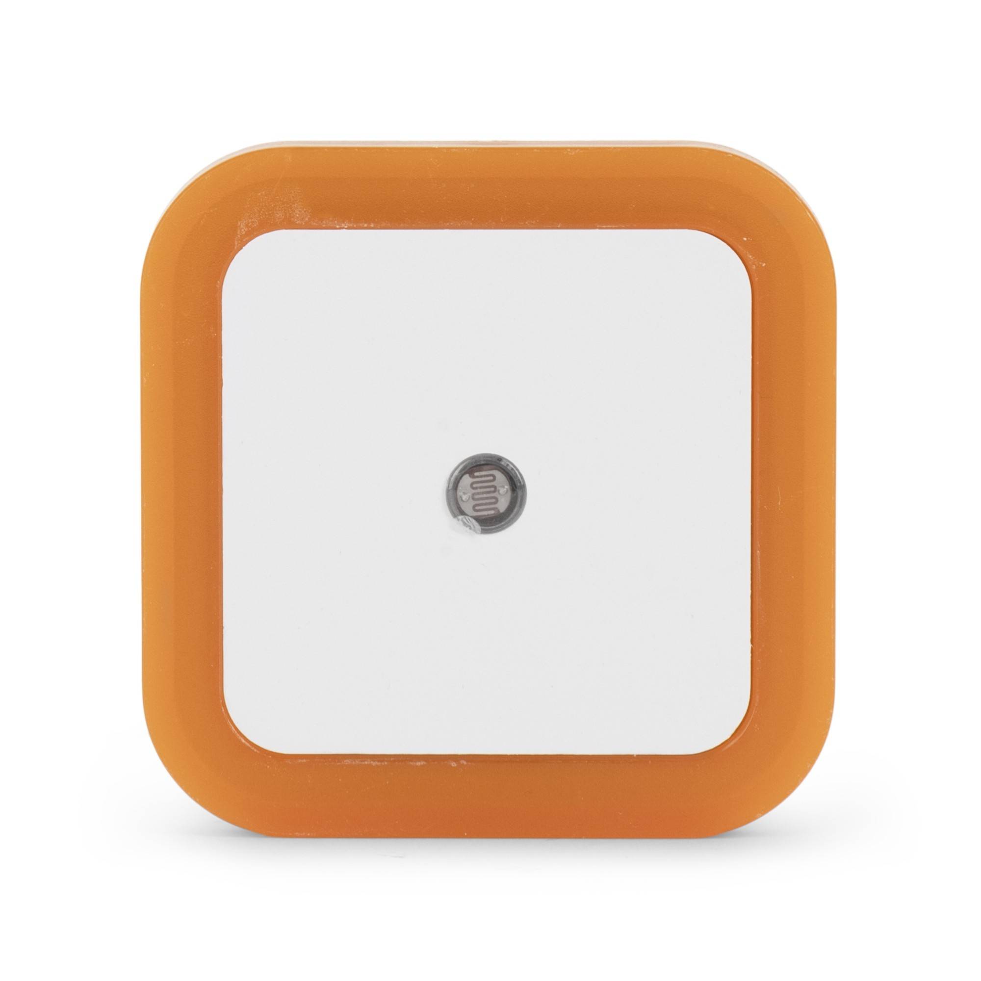 Quadratisches weißes Gerät mit einem orangefarbenen abgerundeten Rahmen und einem kleinen zentralen Sensor, gezeigt vor einem einfachen Hintergrund.