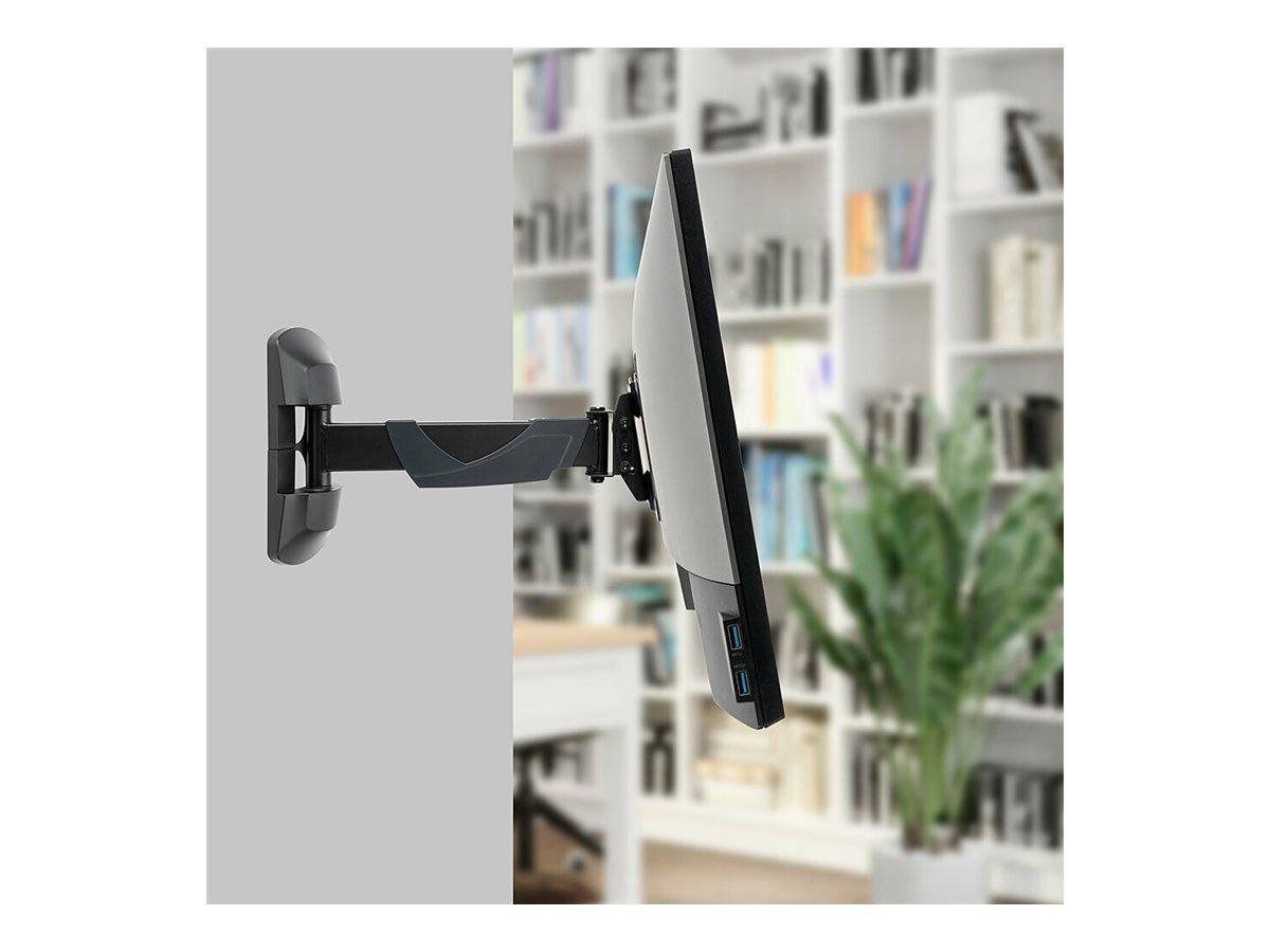 Seitenansicht eines Flachbildschirm-Monitors, der auf einem verstellbaren Wandarm montiert ist, vor einem unscharfen Büro- oder Heimarbeitsplatz-Hintergrund gezeigt.