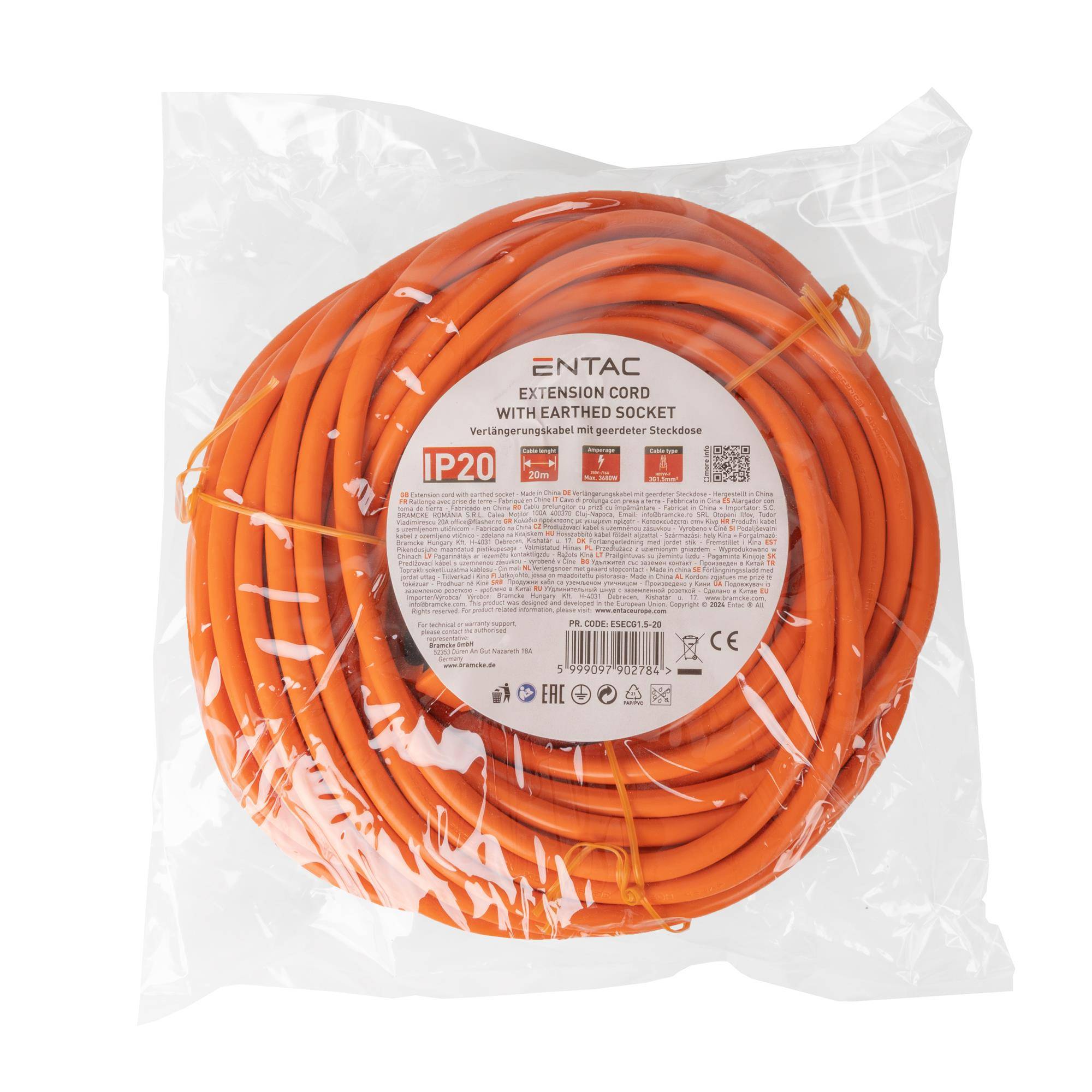Verpacktes orangefarbenes Verlängerungskabel aufgewickelt in einer durchsichtigen Plastiktüte, beschriftet mit 'ENTAC' und 'EXTENSION CORD WITH EARTED SOCKET' mit IP20-Schutzart.