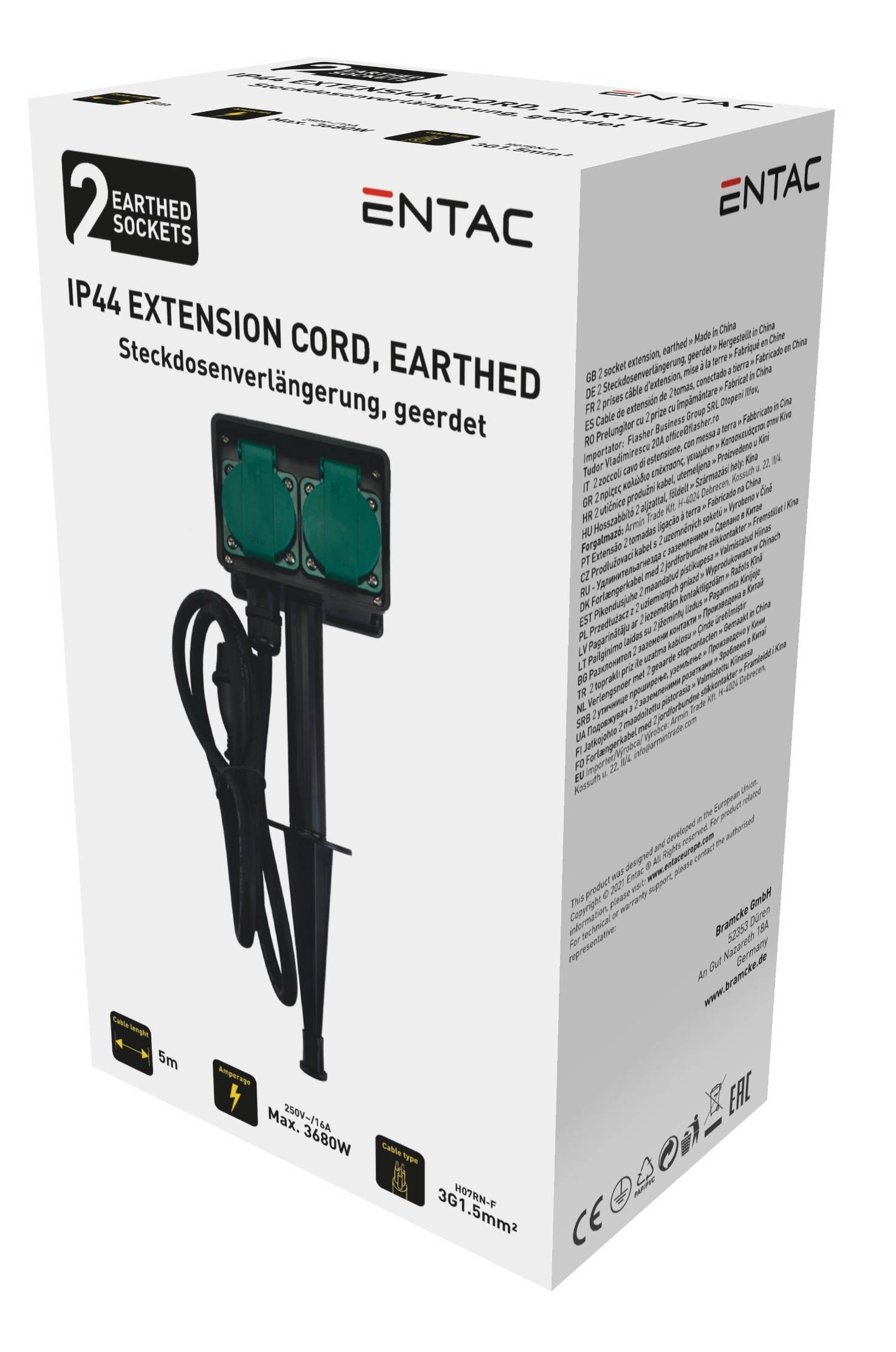Verpackung für ein ENTAC IP44 Verlängerungskabel mit zwei geerdeten Steckdosen auf einem Erdspieß, gezeigt auf einer weißen Schachtel mit Produktbildern und mehrsprachigem Text.