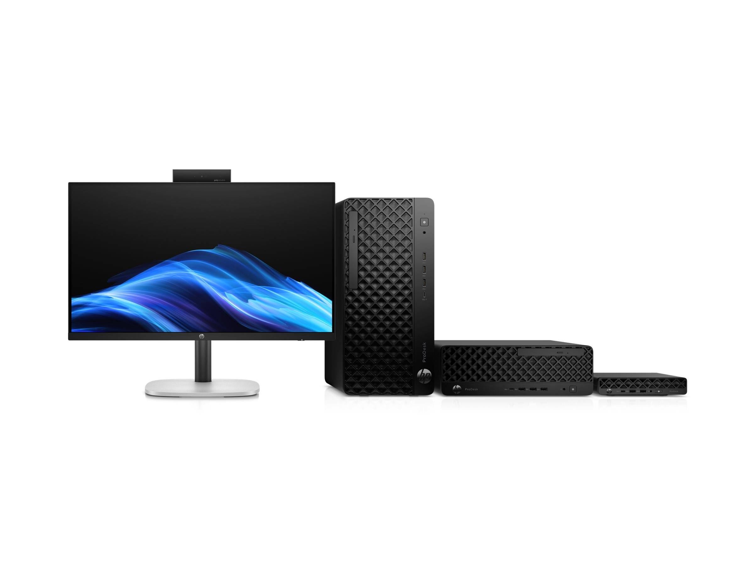 Ein Desktop-Monitor, ein Tower und kompakte Peripheriegeräte auf weißem Hintergrund angeordnet, dargestellt als schlanke All-in-One-Computeranlage.