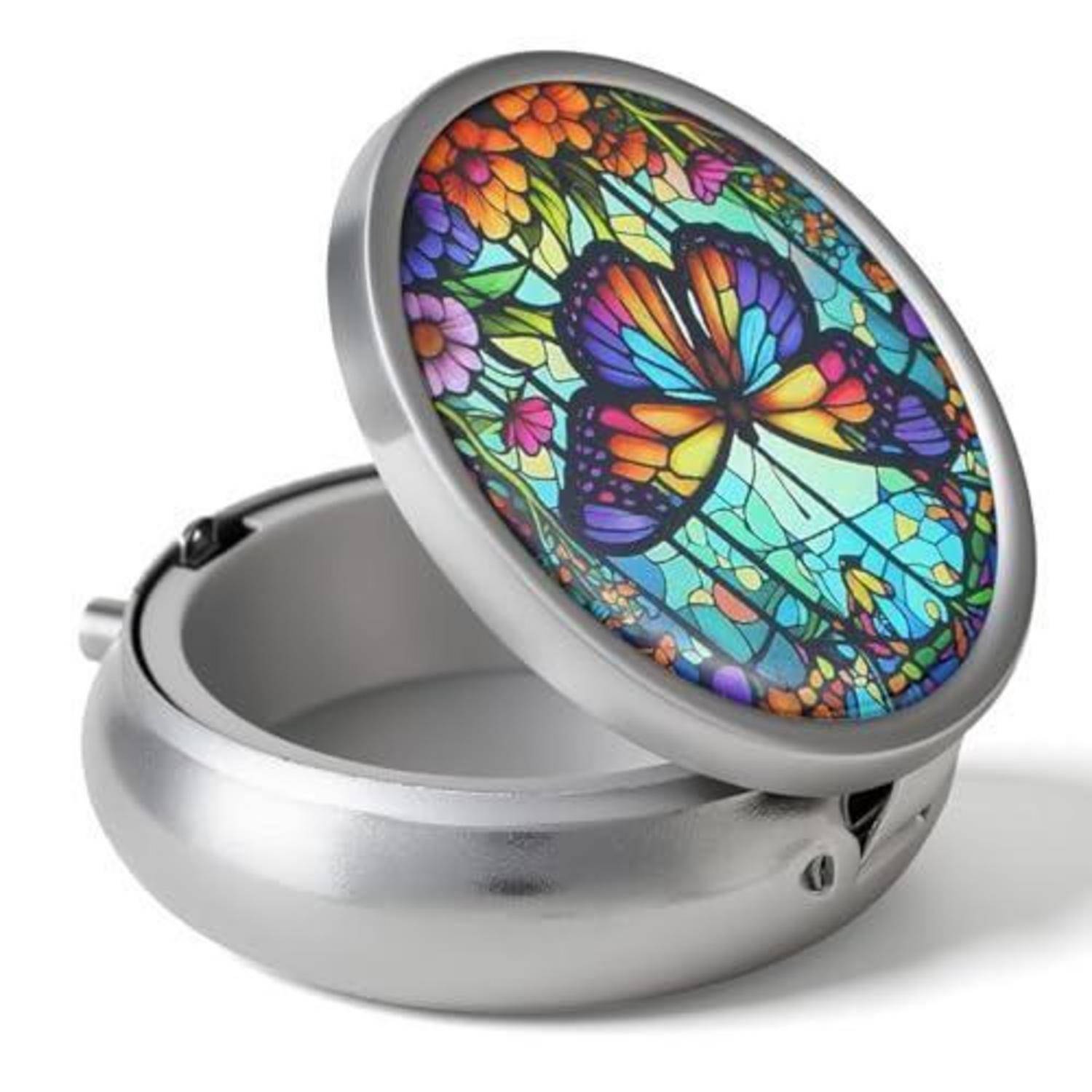 Runde Silberdose mit Scharnierdeckel, verziert mit einem farbenfrohen Schmetterlings- und Blumenmosaik-Design.