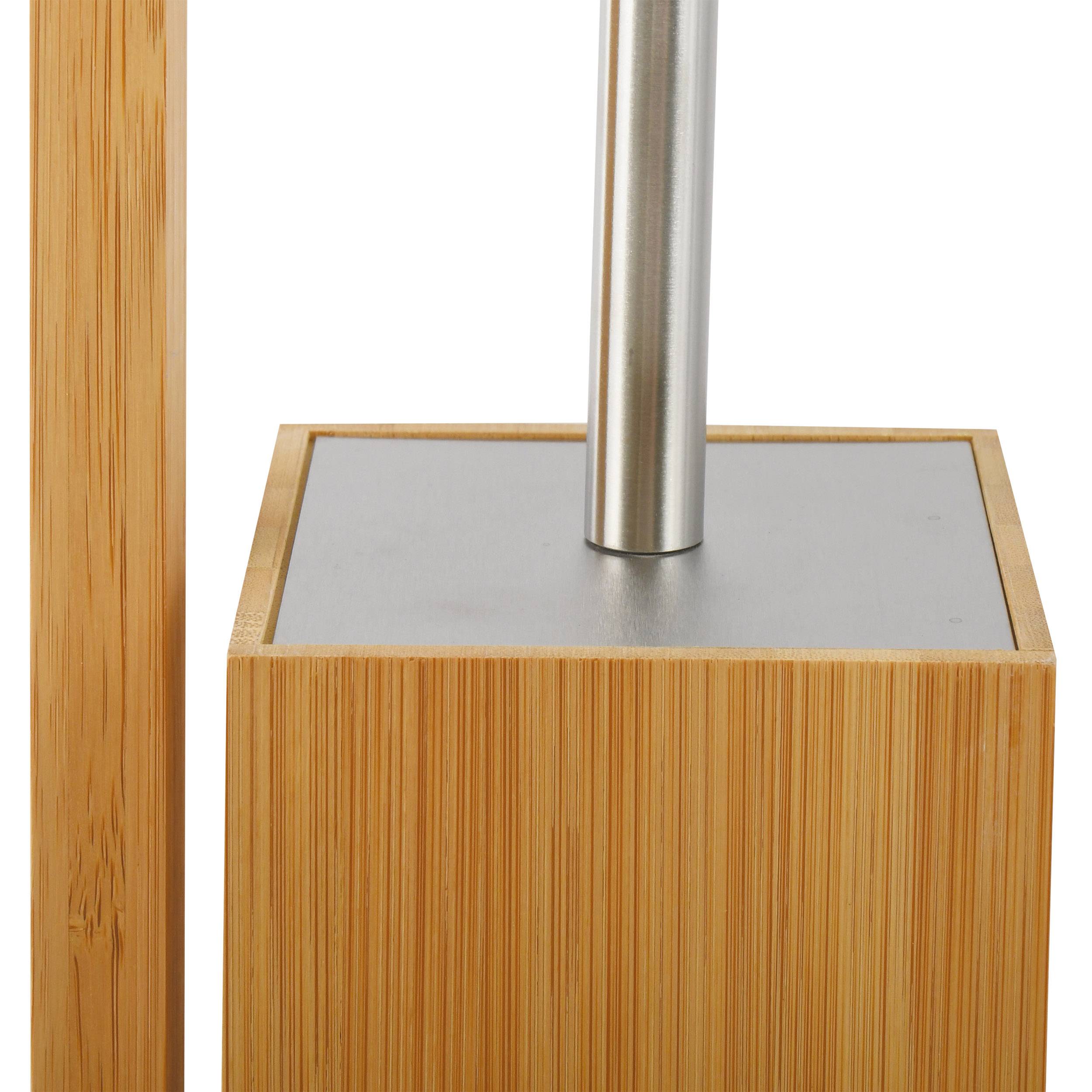 Nahaufnahme einer rechteckigen Basis im Bambusstil mit einem Edelstahlpfosten, wahrscheinlich Teil eines Ständers oder einer Lampe.