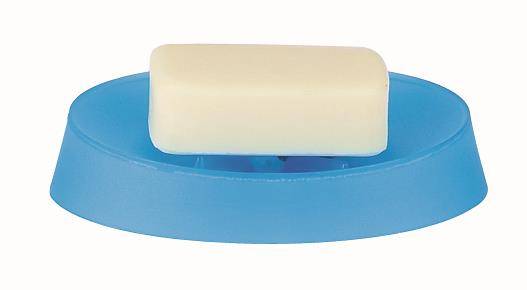 Ein weißer Seifenriegel auf einer blauen Seifenschale ruhend.