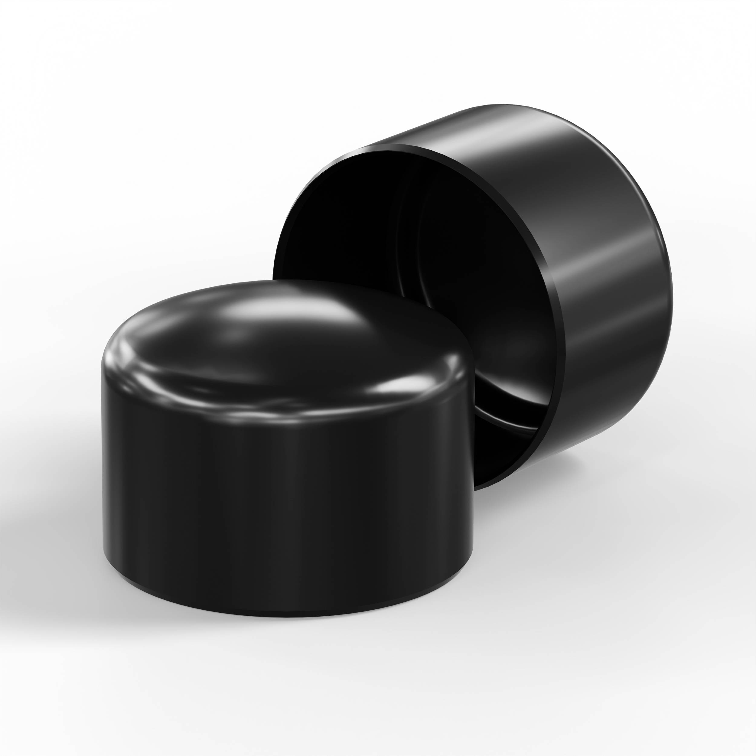 Zwei schwarze zylindrische Kosmetiktiegel-Deckel, einer vorne geschlossen und einer hinten offen, auf weißem Hintergrund.