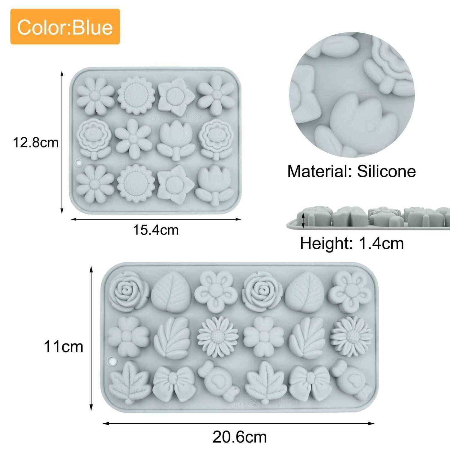 Blaue Silikonform mit zwei Behältern: einer 15,4 x 12,8 cm und einer 20,6 x 11 cm, beide 1,4 cm hoch, mit blumen- und blattförmigen Vertiefungen.