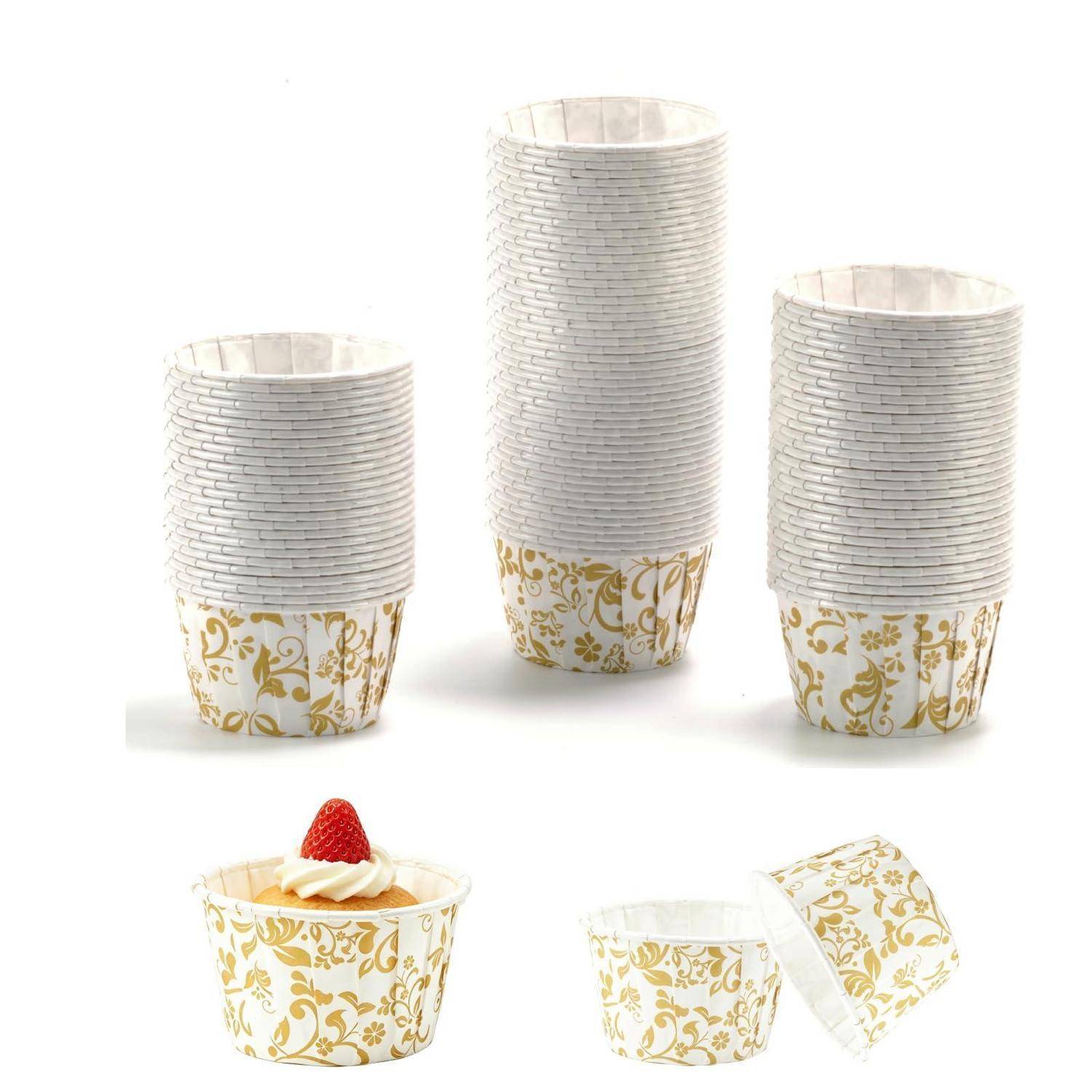 Goldene Blütenpapierbecher in drei Größen, mit zwei kleinen Dessertbechern unten dargestellt, auf weißem Hintergrund.