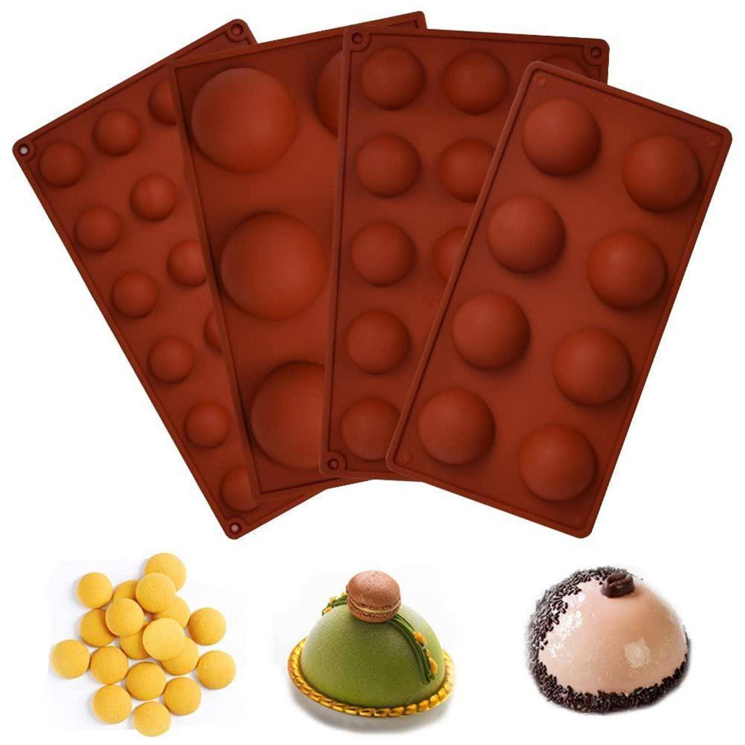 Silikon-Halbkugel-Formen mit Beispielen von fertigem Schokoladendessert: gelbe Kugeln, eine grüne Kuppel mit Macaron und ein rosa Kuppel-Dessert.