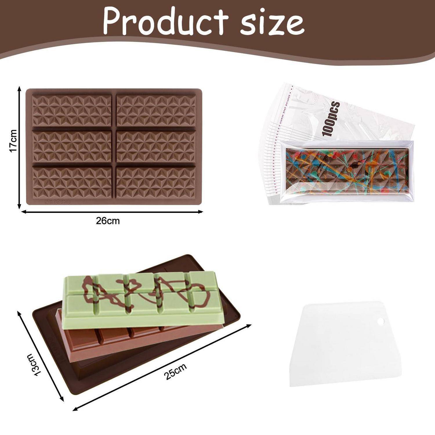 Größentabelle für das Produkt mit einer rechteckigen Schokoladenform 26 cm x 17 cm, Abmessungen der verpackten Riegel, eine Ansicht der Geschenkbox und ein weißes Schabwerkzeug.