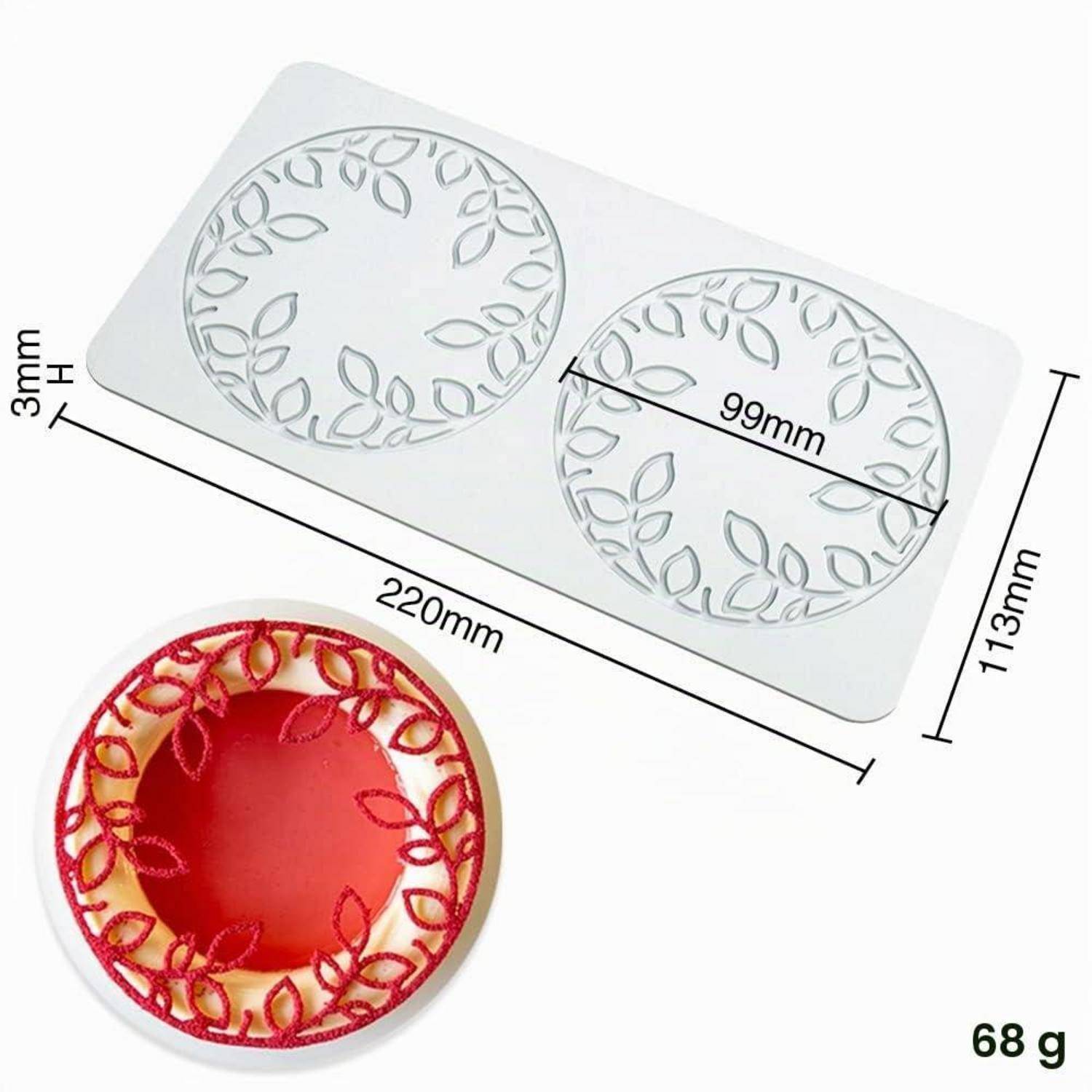 Bild eines rechteckigen Prägewerkzeugs mit Blattmuster und zwei runden Designs, beschriftet mit 220 mm x 113 mm und 3 mm Dicke; ein Design zeigt ein rotes fertiges Muster, 68 g.