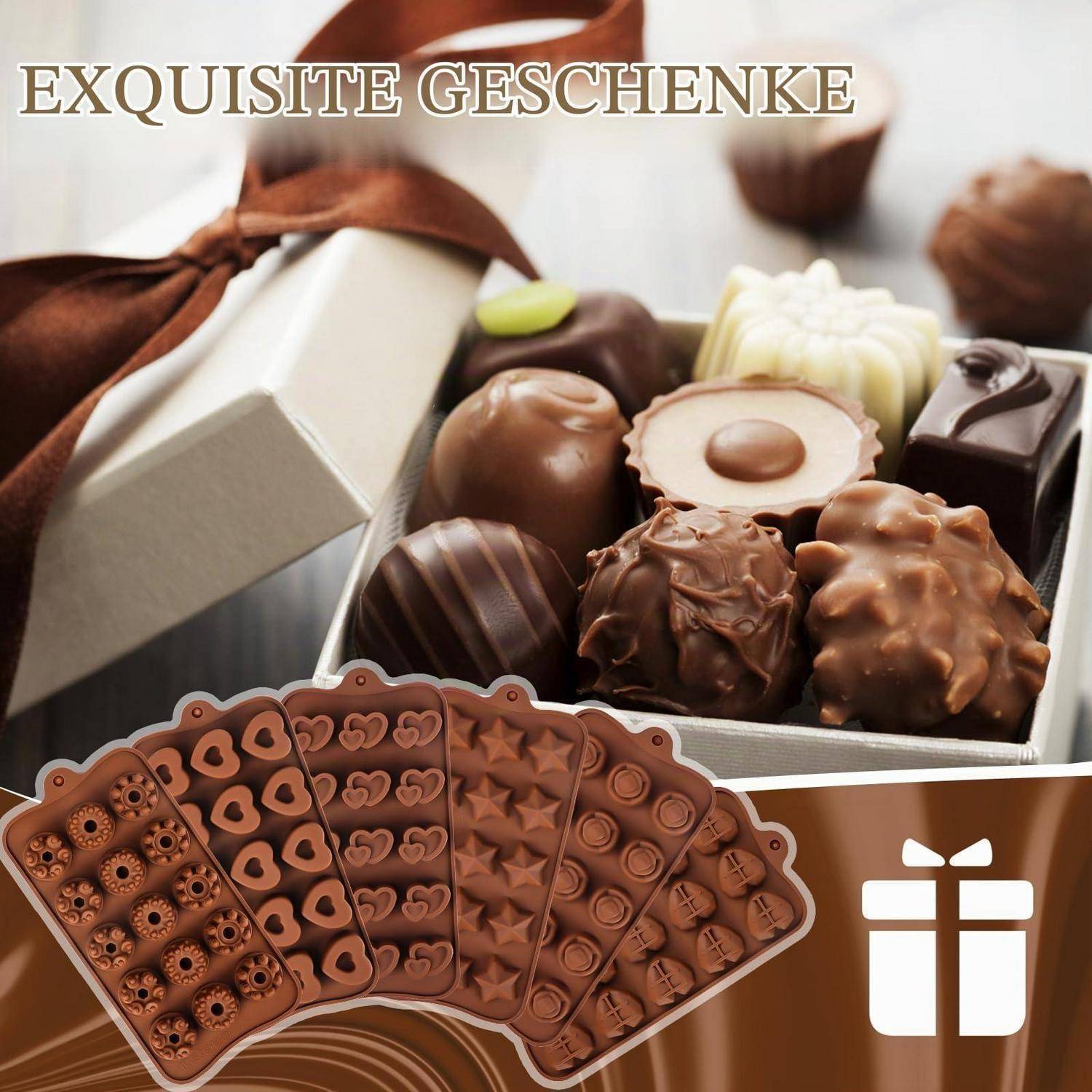 Geschenkbox mit assotierten Pralinen, gebunden mit einem braunen Band, beschriftet mit „EXQUISITE GESCHENKE