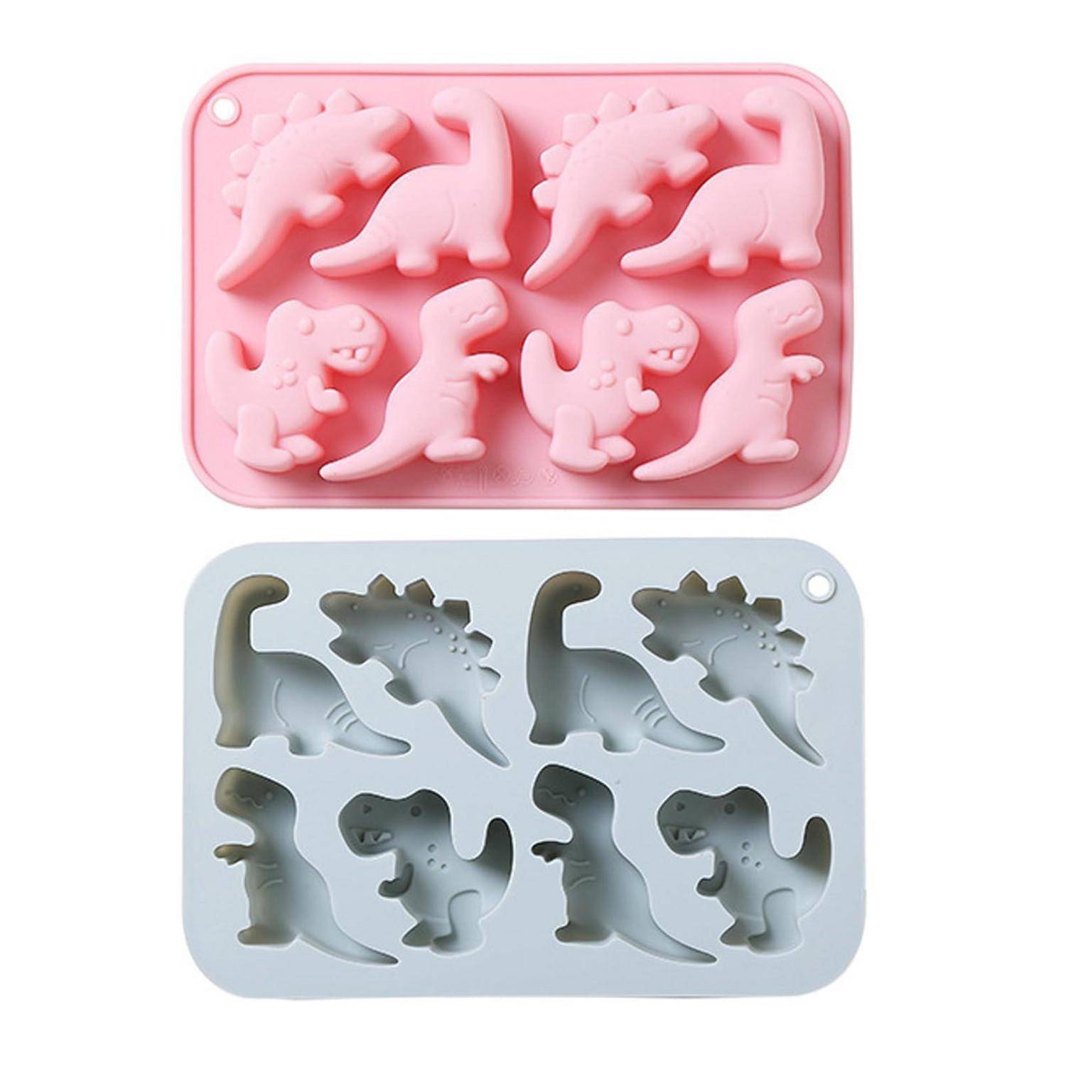 Zwei silikon-dinosaurier-förmige Formen, eine rosa und eine grau, jeweils mit mehreren hohlraumformen zum Herstellen von Süßigkeiten oder Eiswürfeln.