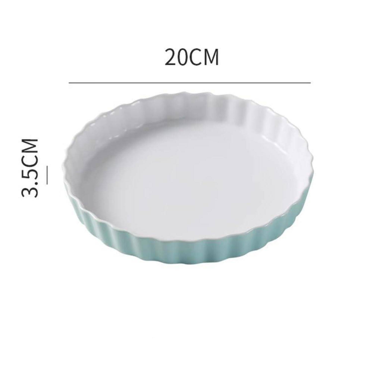 Rundes Backgeschirr mit wellenförmigem Rand, weißem Innenraum und blaugrünem Außenbereich, beschriftet mit 20 cm Breite und 3,5 cm Höhe.