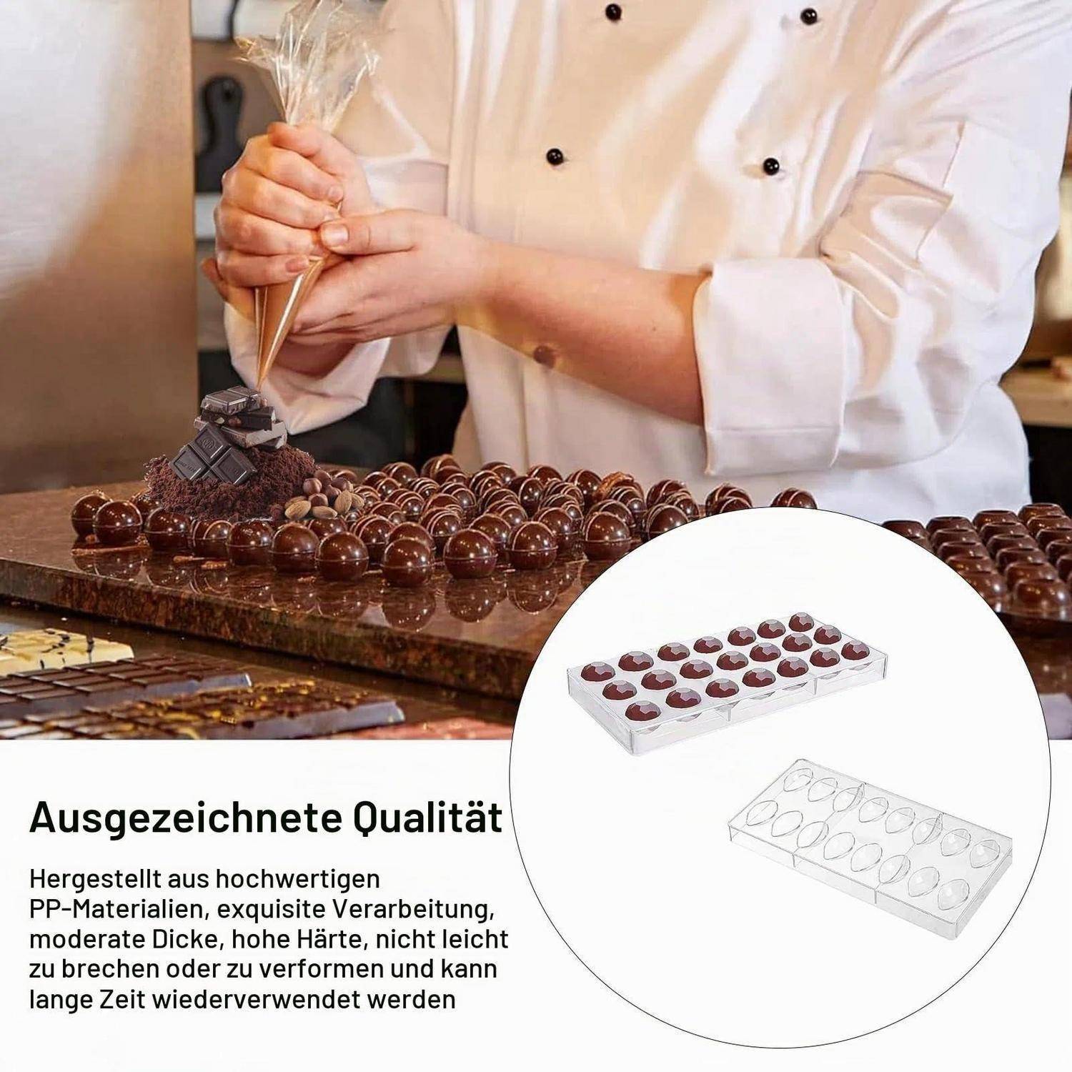 Schokoladenhersteller trägt Verzierung auf Reihen von Schokoladen auf, mit deutschem Text, der „Ausgezeichnete Qualität