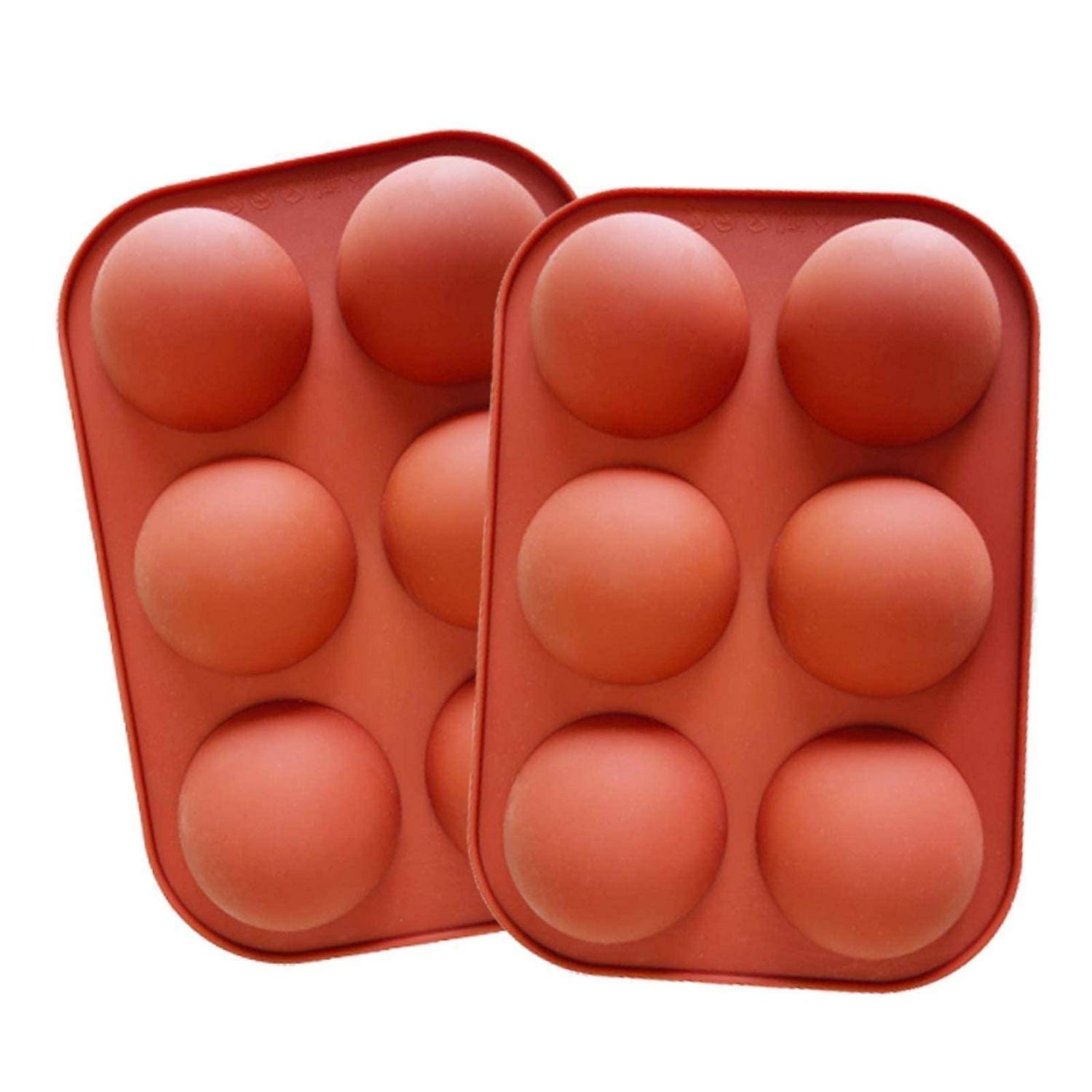 Zwei rote Silikon-Pop-it-Fidget-Spielzeuge mit jeweils sechs kreisförmigen Blasen, die sich auf weißem Hintergrund überlappen.