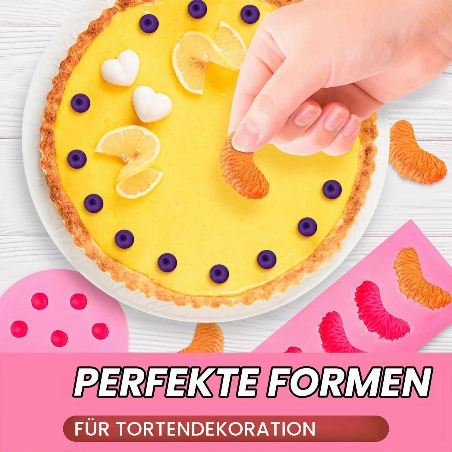 Hand dekoriert eine Zitronentorte mit einem orangefarbenen Bonbonstück; der Bildtext sagt „PERFEKTE FORMEN